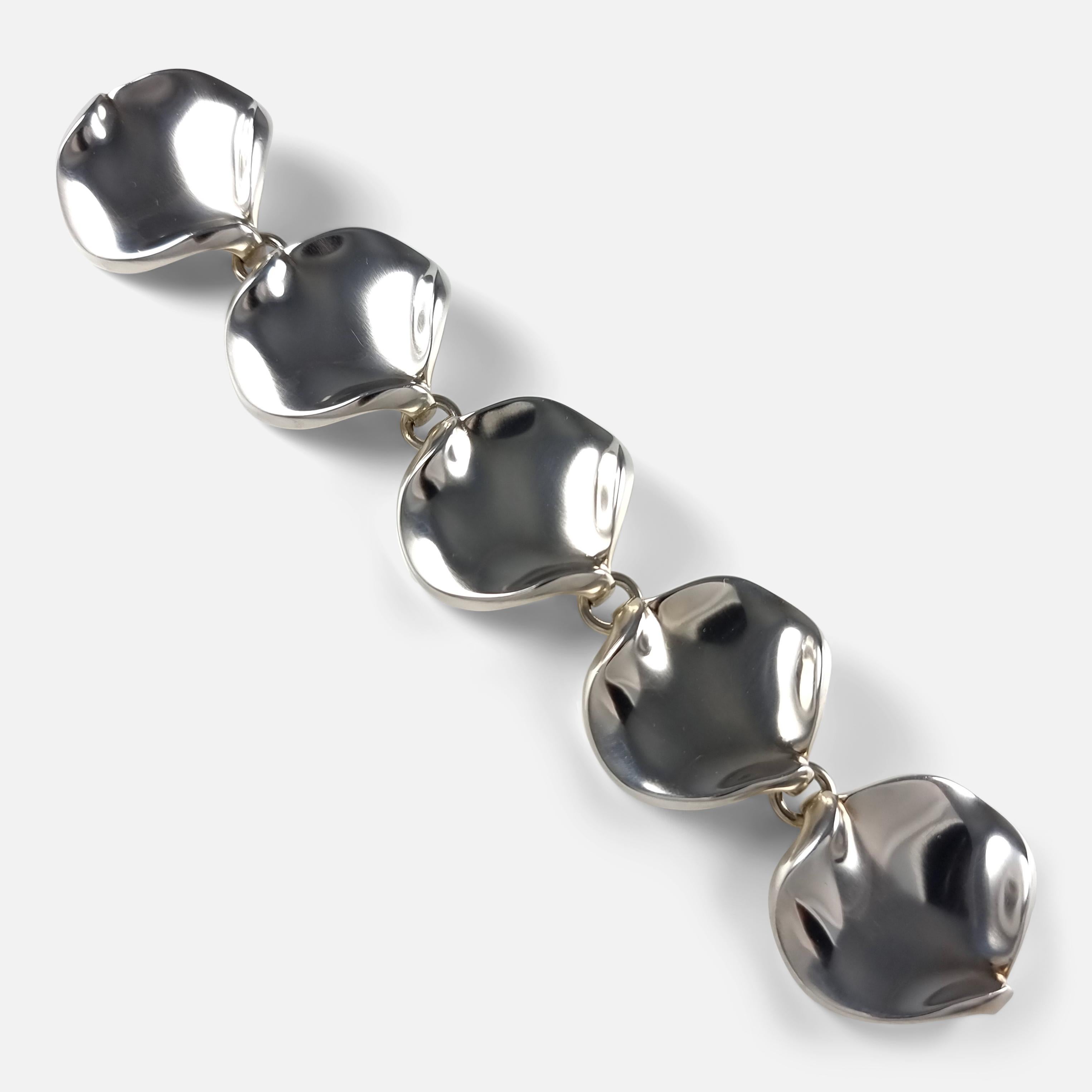 A sterling silver bracelet, designed by Hans Hansen for Georg Jensen. 

The bracelet is stamped with the Georg Jensen within a dotted oval marking (used since 1945), Hans Hansen marks, 