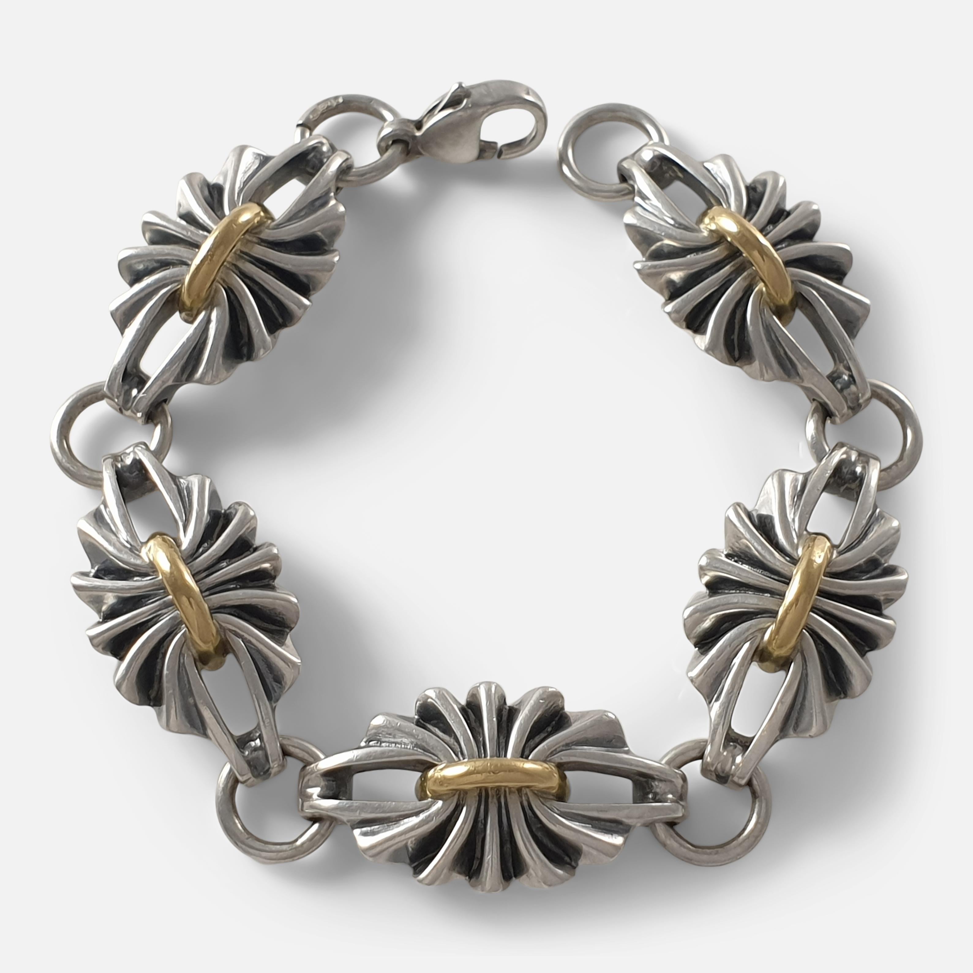 A sterling silver gilt bracelet #394, designed by Lene Munthe for Georg Jensen. 

The bracelet is stamped with the Georg Jensen within a dotted oval marking (used since 1945), 