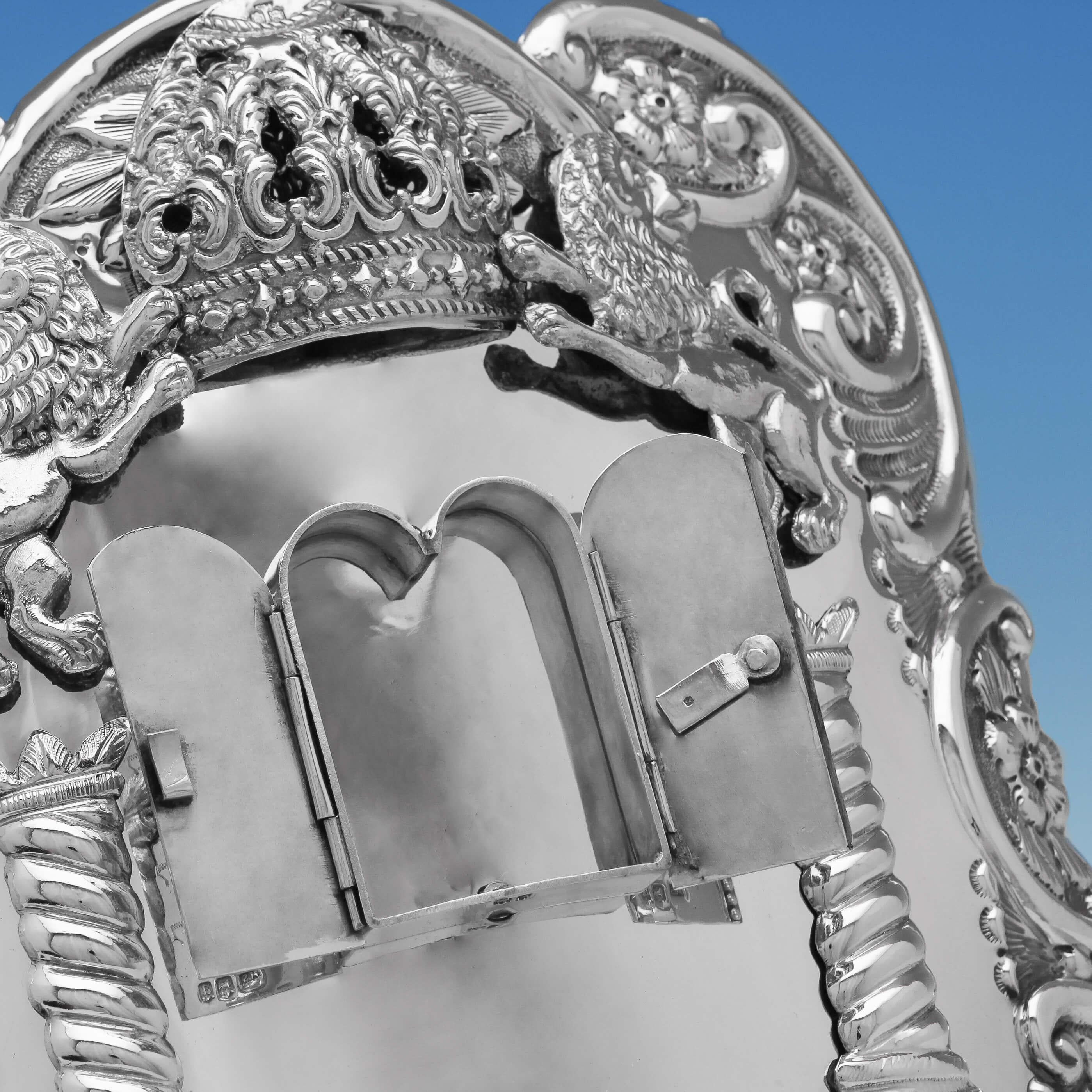 Hallmarked in London in 1916 by Morris Salkind, this fine George V, Antique, sterling silver breast plate, features decoration depiction the tablets with the engraved Ten Commandments in Hebrew, two columns representing the columns of the Temple of