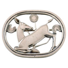 Sterling silver brooch by Georg Jensen. Design number 256. Deer motif. 