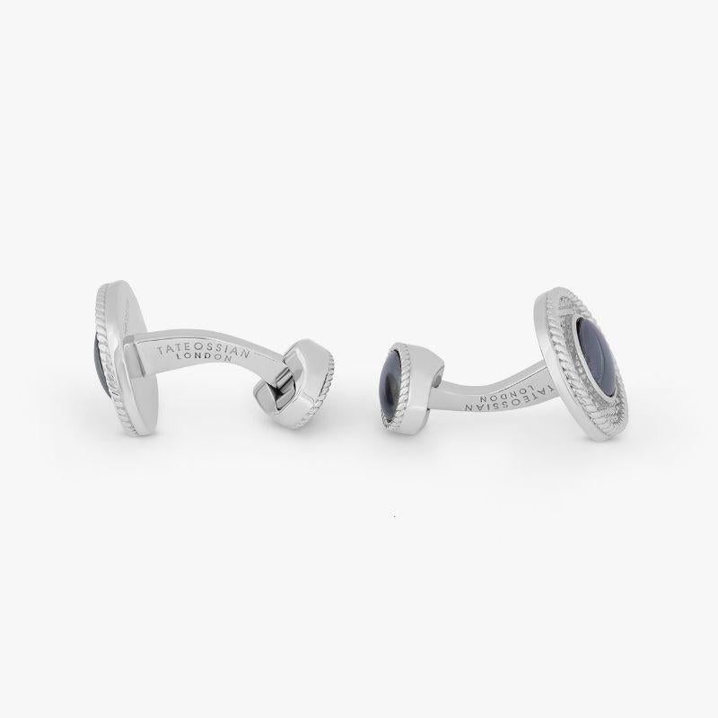 Sterling Silver Cable Oval Cufflinks with Hematite

Featuring stones that each have a unique lustre, these unusually shaped oval stones are set within a polished sterling silver case that has been engraved with our signature diamond pattern. These