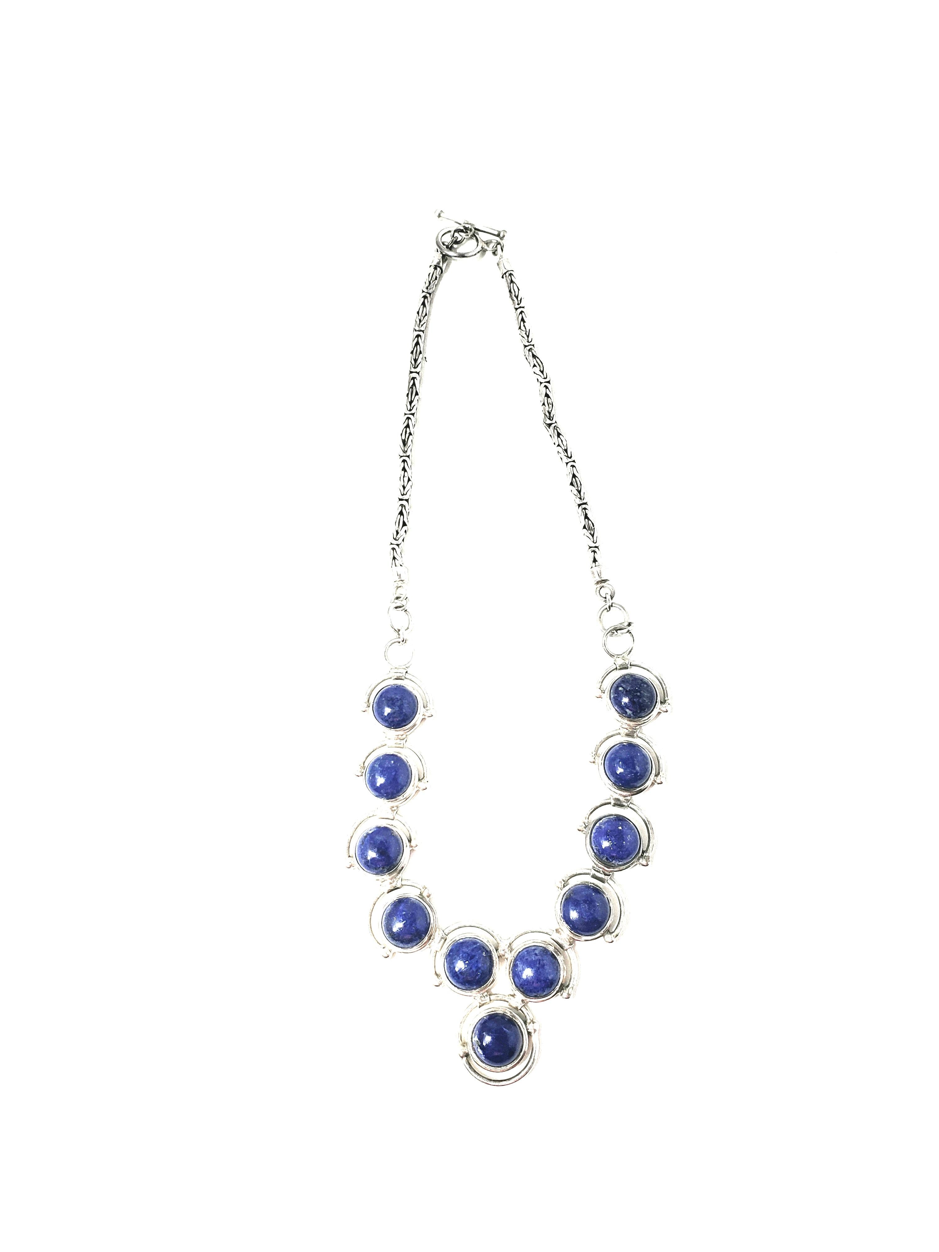 Sterling Silver Cabochon Lapis Lazuli Link Necklace

This is a stunning sterling silver cabochon lapis lazuli link necklace.  

Measurements:     Measures 17 inches.  8mm thick.  11 stones that measure 10mm.  
 
Weight:  52.6 g /  33.8 dwt  