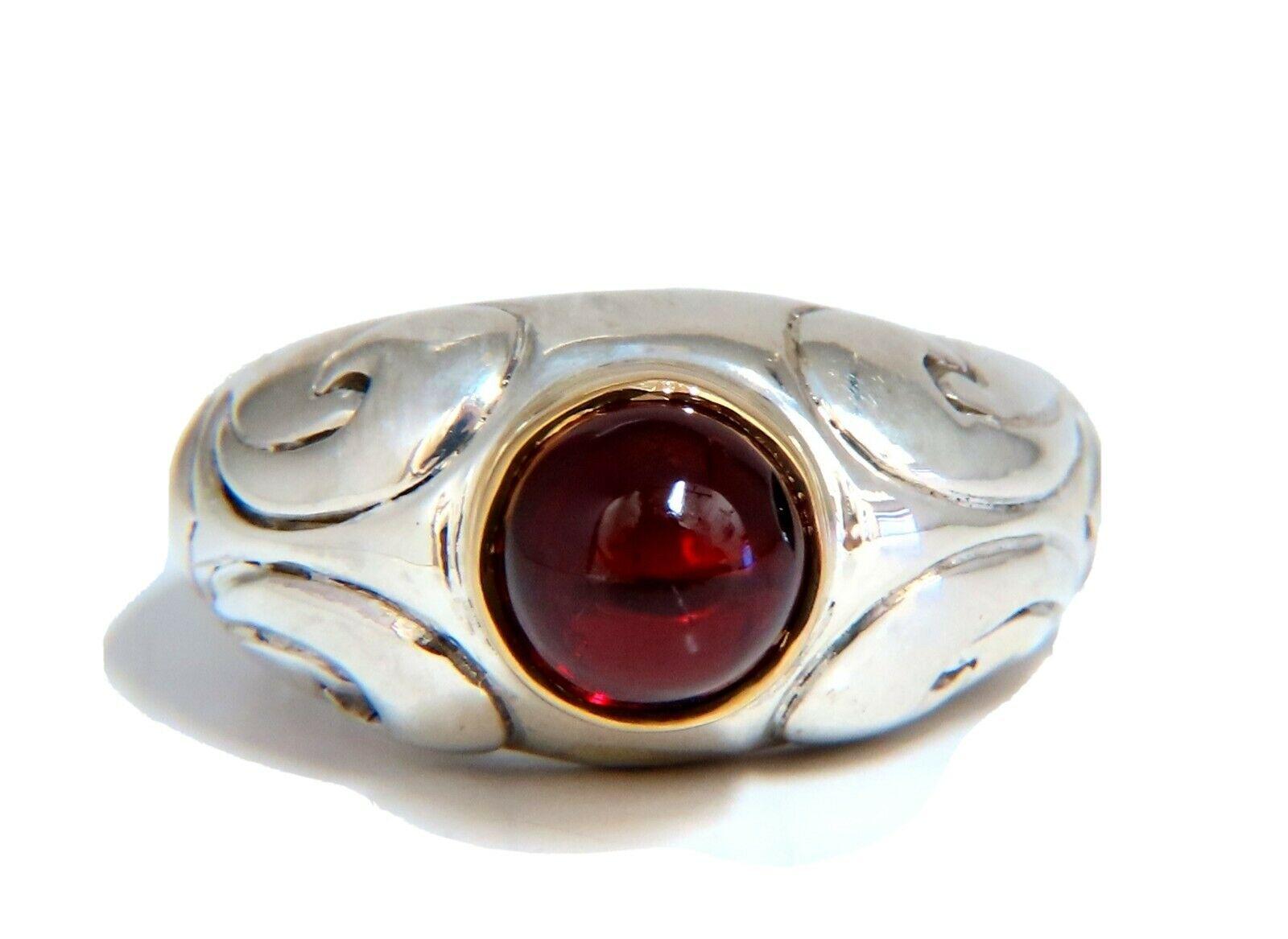 2 carat natural cabochon crimson red garnet ring

Garnet measures 6.7 mm diameter

Clean clarity and transparent


Total weight 8.1 g

Depth of ring 10.5 mm

Ring is 11 mm wide

Size 6 and 1/2 and we may resize