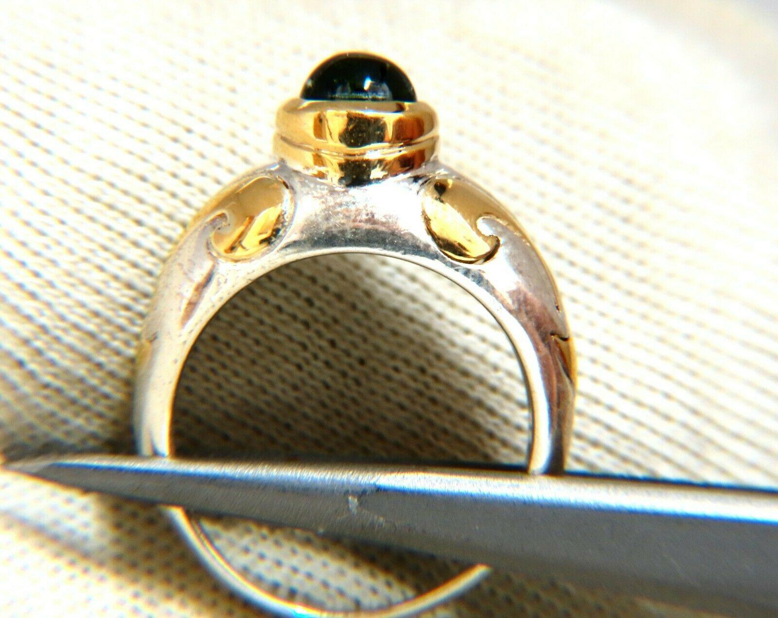 1 carat natural cabochon Green tourmaline ring

Tourmaline measures 5 mm diameter

Clean clarity and transparent


Total weight 7.2 g

Depth of ring 9.8 mm

Ring is 9.8 mm wide

Size 6 and 1/2 and we may resize

Ring composed of 18 karat gold and