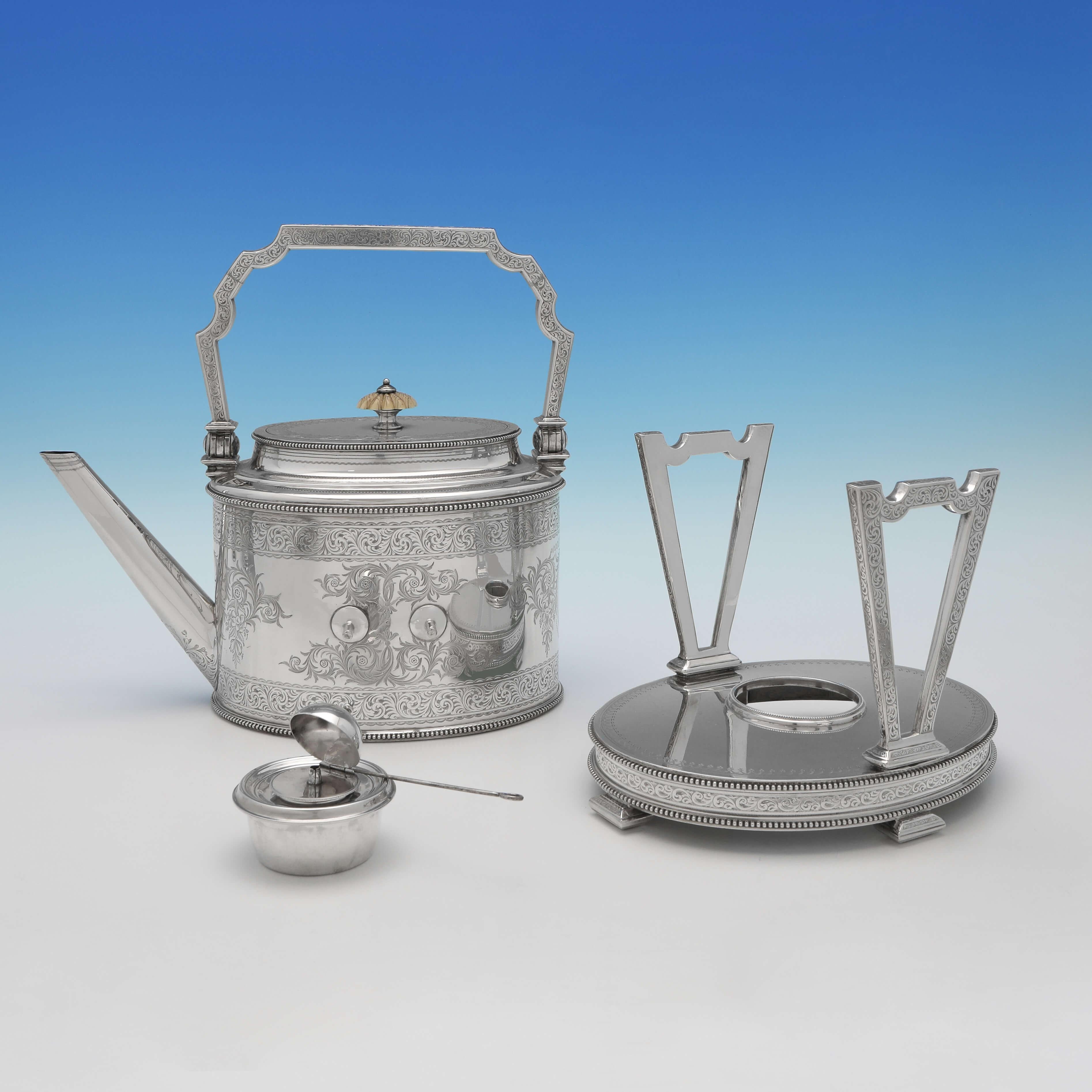 Hallmarked in Birmingham between 1873 and 1876 by Elkington & Co., this striking, Victorian, antique sterling silver tea & coffee set, comprises a kettle, a coffee pot, a teapot, a sugar bowl and a cream jug, all in the 'Can' shape, and featuring