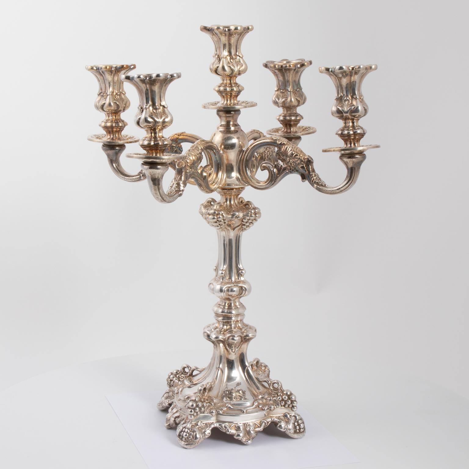 Sterling silver four-arm candelabra. Art Nouveau grape and floral design. Holds five candles. 17.50 inches high. Stamped 925 underneath.
 