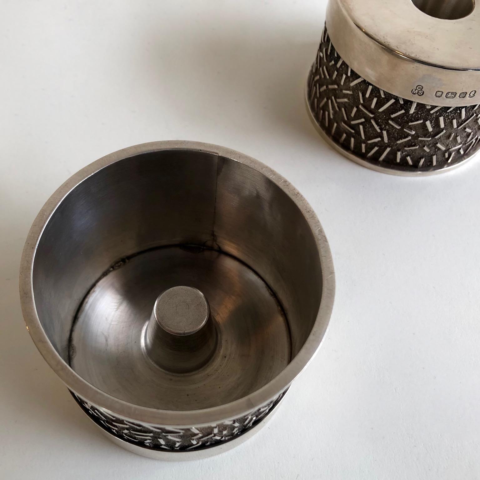 20th Century a pair of modernist 1970's Sterling Silver candleholders, London 1977, signed For Sale