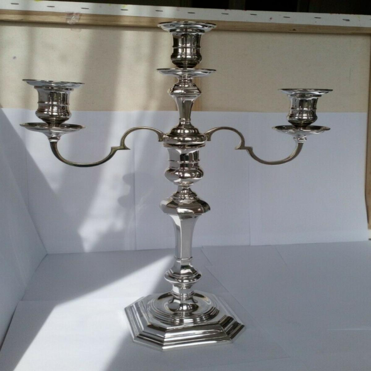 Sterling Silver Candleabra Made by Elkington & Co Ltd from 1967

In good condition, this is a lovely piece. The top part is removable so it can be used as a single candlestick or a candelabra. Hallmarked: Made by Elkington & Co Ltd in Newhall