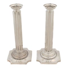 Candelabros de plata de ley