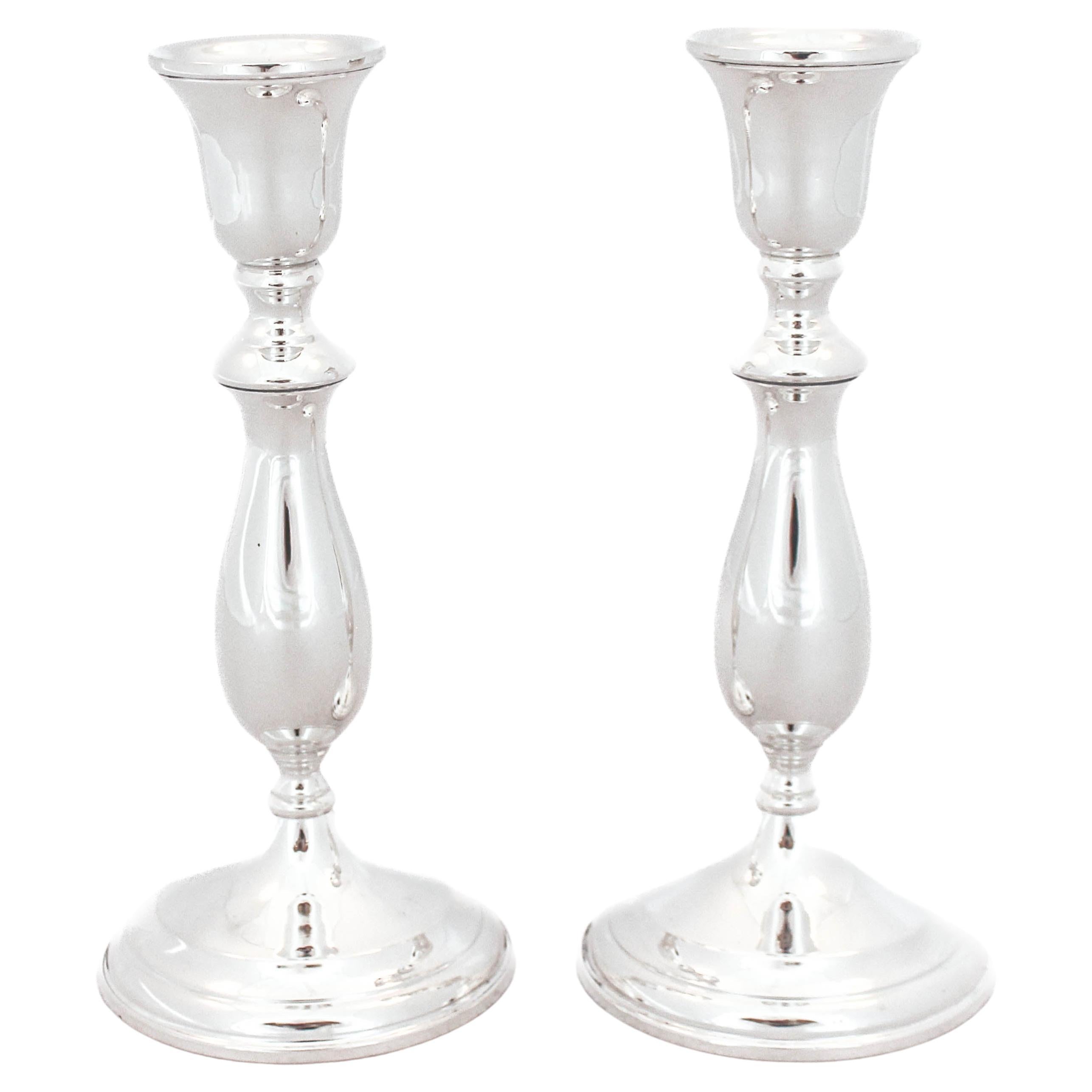 Candelabros de plata de ley