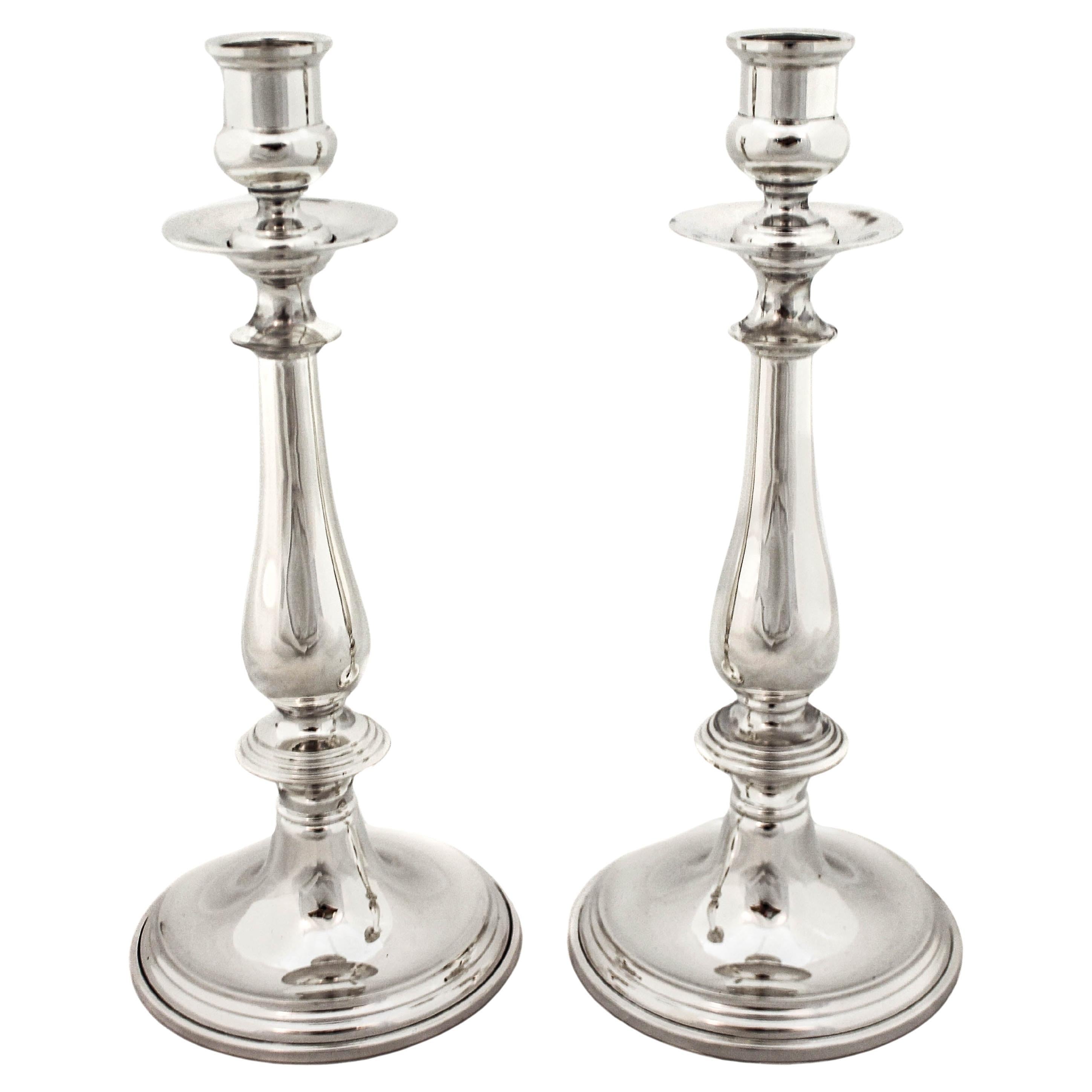Candelabros de plata de ley