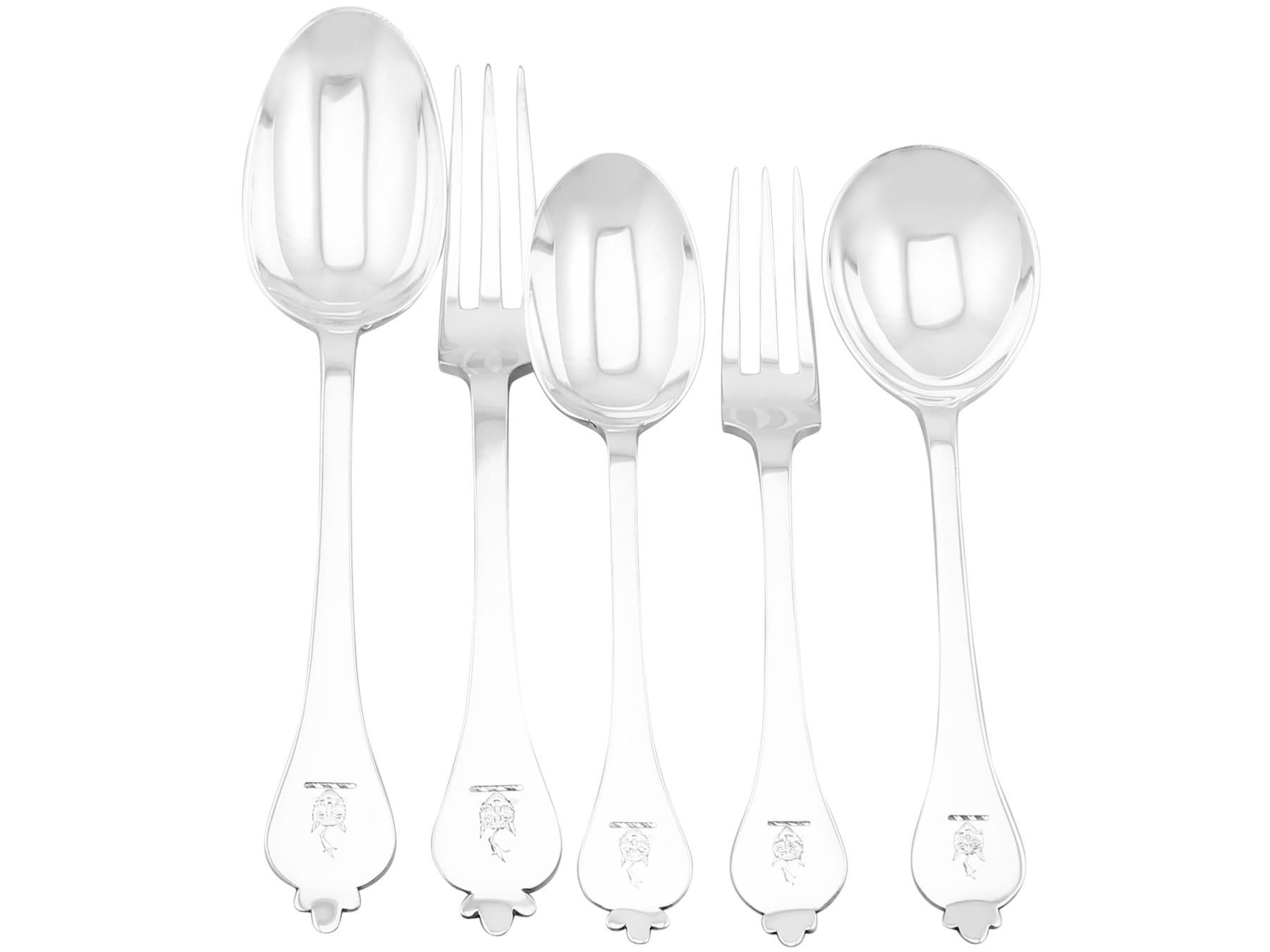 An exceptional, fine and impressive antique and vintage English sterling silver Trefid style pattern flatware service for 12 persons; an addition to our antique flatware sets.

The pieces of this exceptional antique and vintage sterling silver