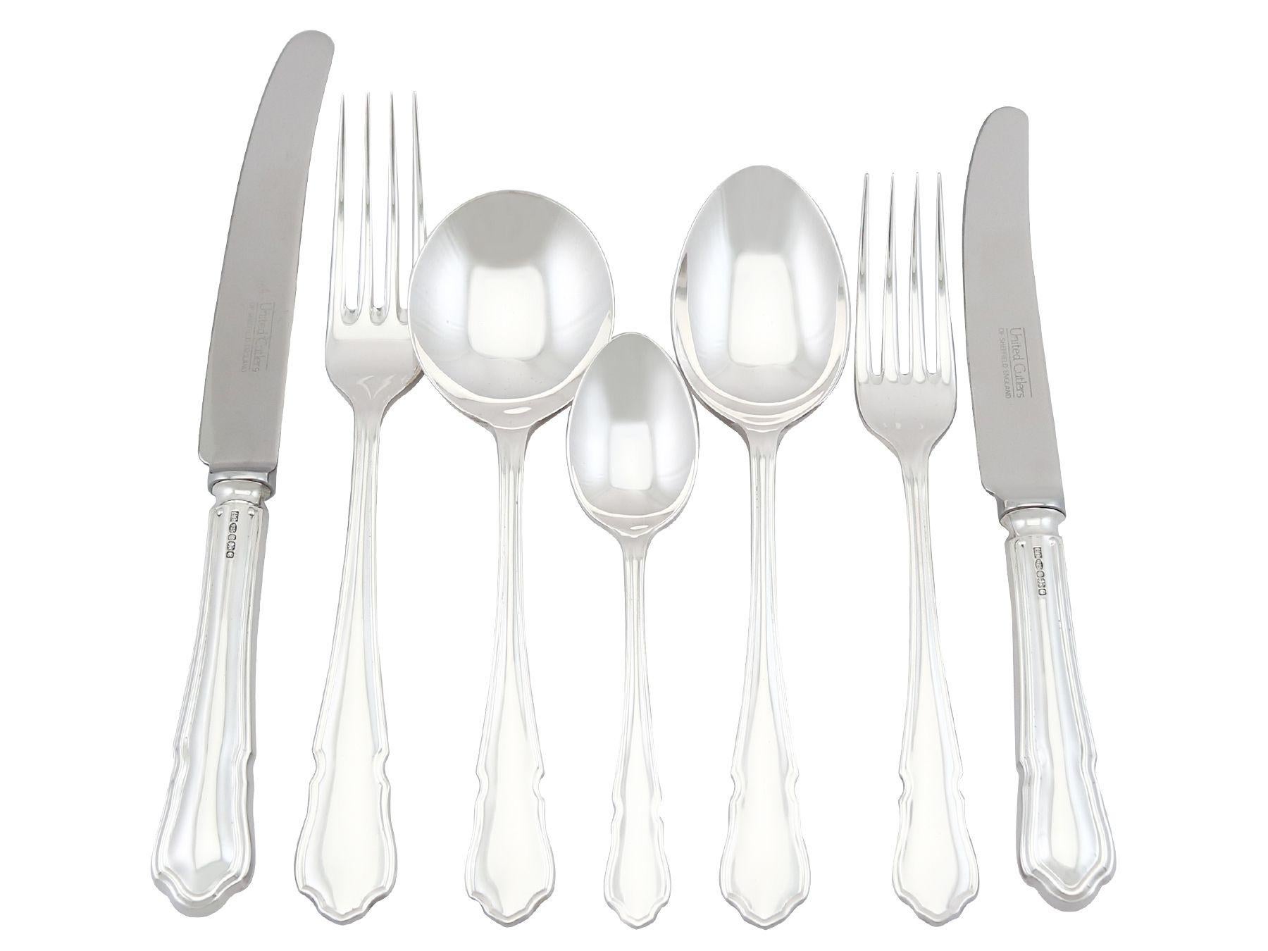 An exceptional, fine and impressive contemporary Elizabeth II English sterling silver flatware service for six persons; an addition to our silver cutlery collection.

The pieces of this exceptional vintage Elizabeth II sterling silver canteen of