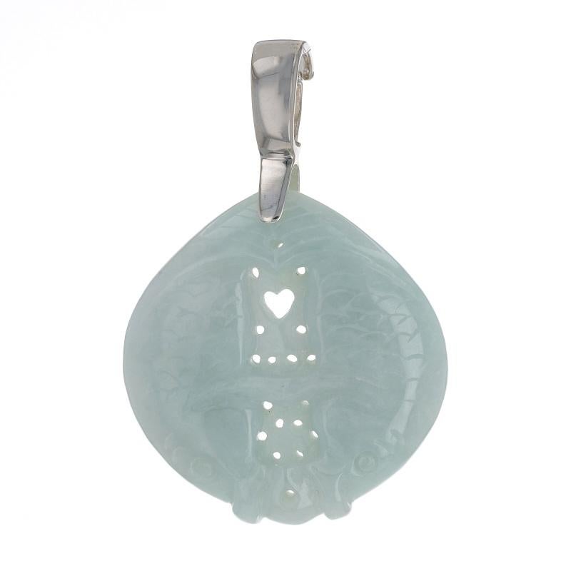 Metal Content: Sterling Silver

Stone Information
Natural Jadeite
Treatment: Routinely Enhanced
Cut: Carved
Color: Light Green

Style: Enhancer
Theme: Two Fish, Aquatic Life

Measurements
Tall (from extended bail): 2 15/32