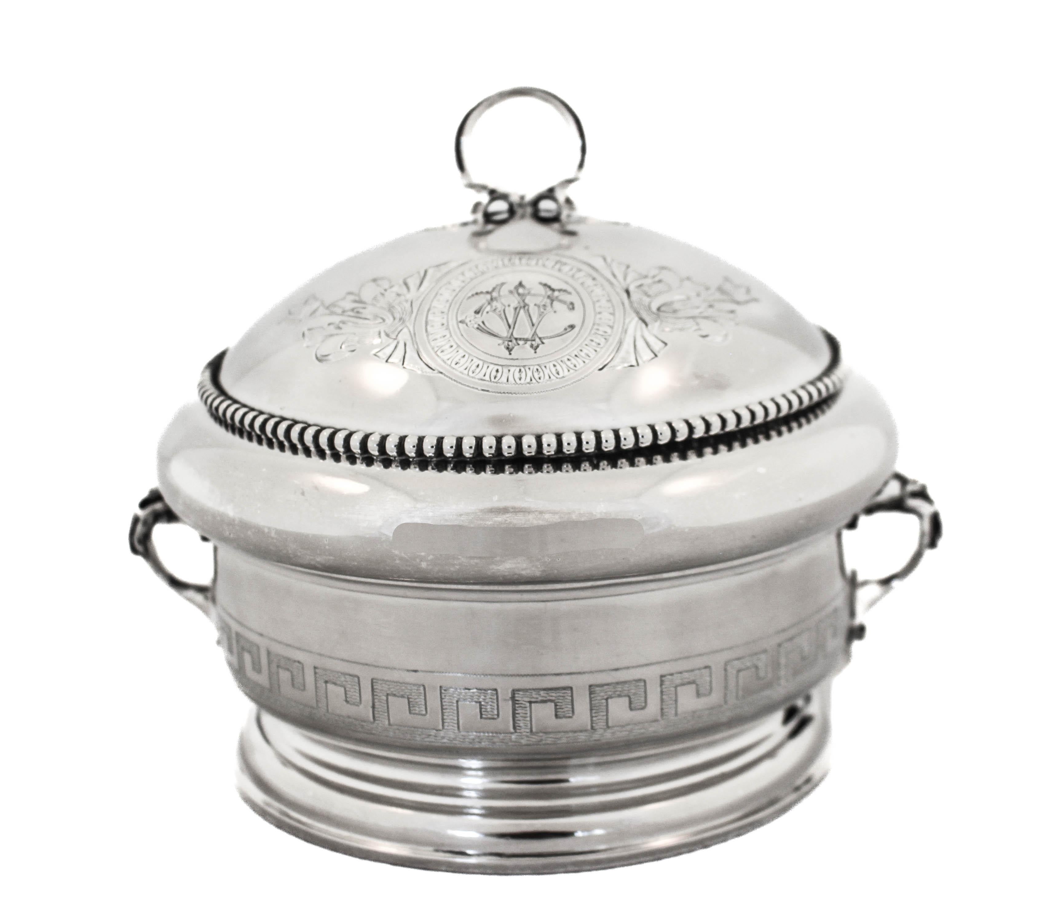 Being offered in an antique caviar dish with a cover by Gorham Silversmiths of Providence, Rhode Island.  There is a removable disc / surface on the inside and ice is placed underneath and the caviar is placed on that surface so it stays chilled. 