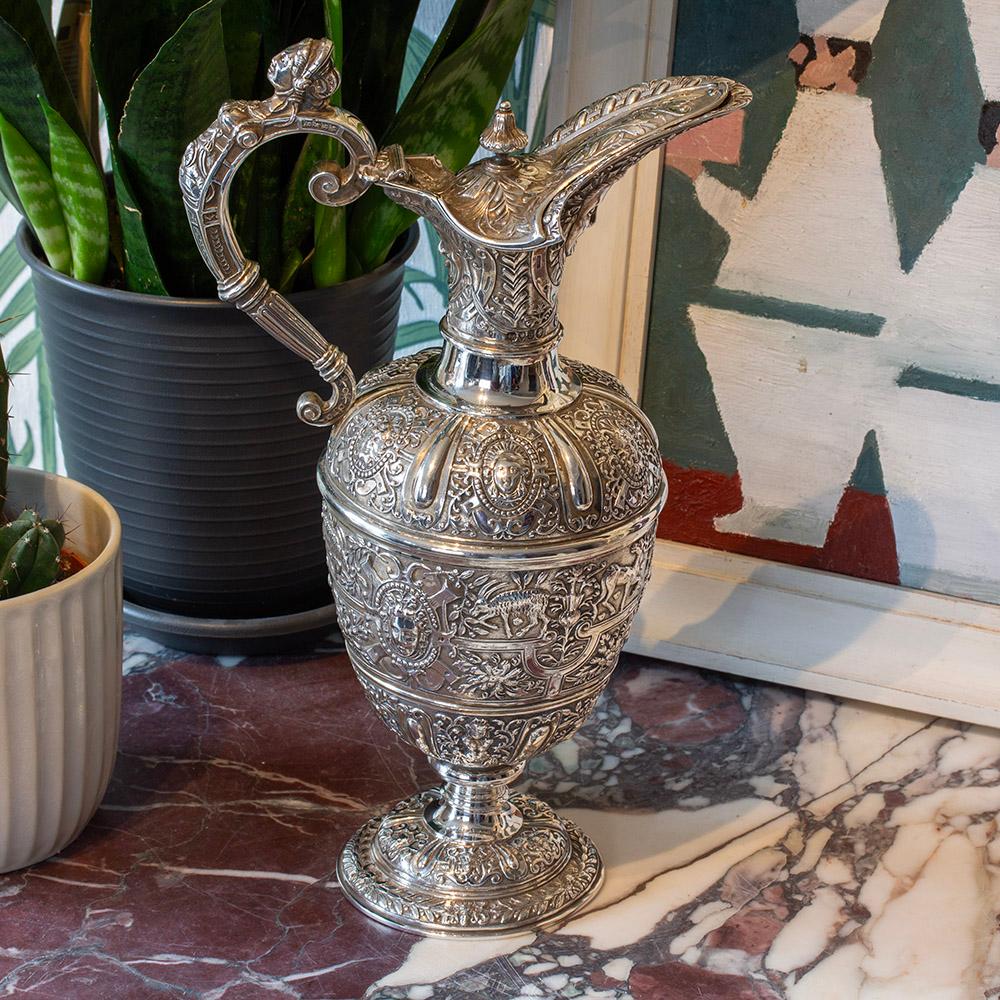 Heavily Chased Decoration Hallmarked Alfred Ivory 1873

From our Silver collection we are pleased to offer this Sterling Silver Cellini Ewer by Alfred Ivory. The Ewer after the famous designs by Italian renaissance metalsmith Benvenuto Cellini. The
