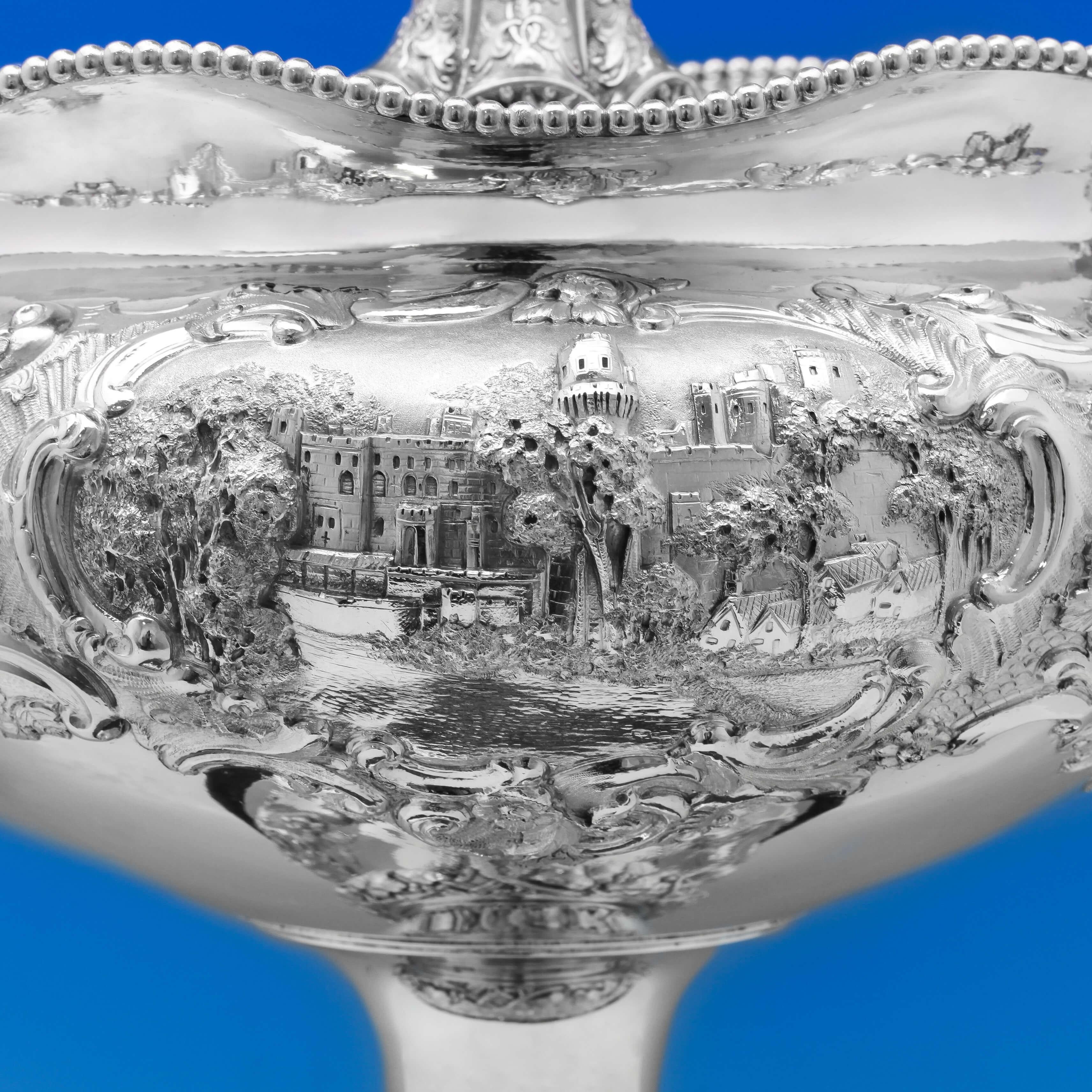 Hallmarked in London in 1876 by Robert Hennell III, this wonderful, Victorian, antique, sterling silver centrepiece, was originally the Warwick Cup race trophy, and stands on a wooden plinth with a beaded band and engraved presentation inscription.