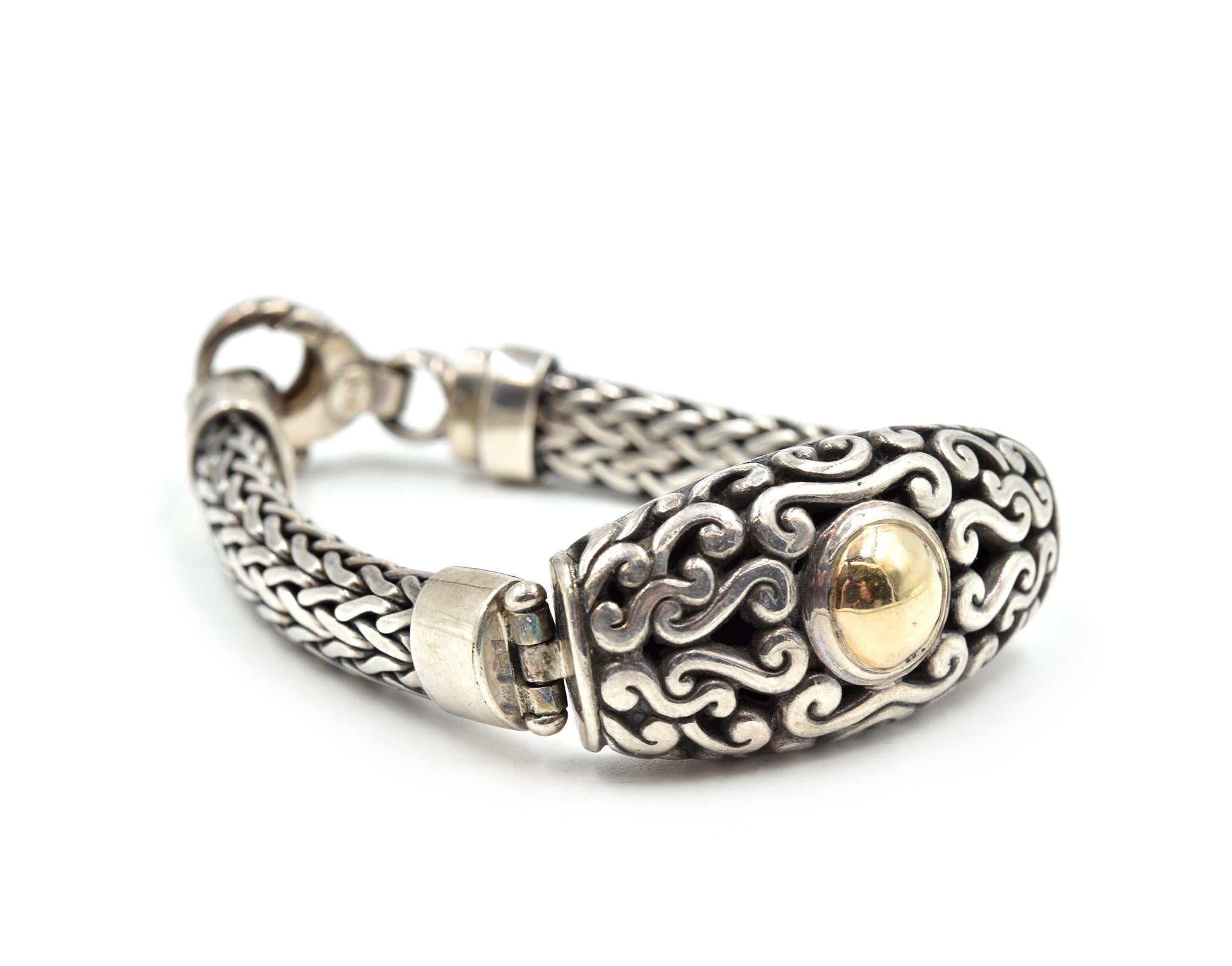 Designer: custom design
Material: sterling silver
Dimensions: the bracelet measures 7 1/2-inches long and 3/4-inch wide
Weight: 65.04 grams
