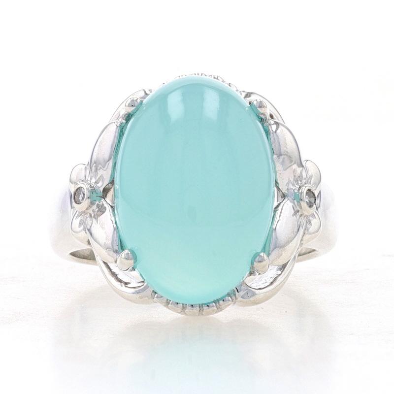 Size: 7
Sizing Fee: Up 2 sizes for $35 or Down 2 sizes for $35

Metal Content: Sterling Silver

Stone Information

Natural Chalcedony
Cut: Oval Cabochon
Color: Greenish Blue

Natural Diamonds
Cut: Single
Stone Note: (two small accents)

Style: