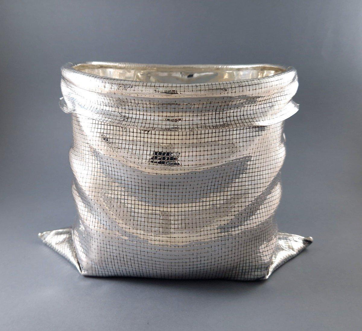 Beautiful champagne bucket in sterling silver imitating a bag 
Italian work around 1970 by Vavassori 
800 Silver hallmark 
Height: 17.2 cm 
Length at the base: 26.2 cm 
Width: 17 cm 
Weight: 1038 grams