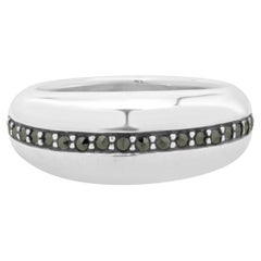 Anillo de plata de ley con marcasita engastada en canal