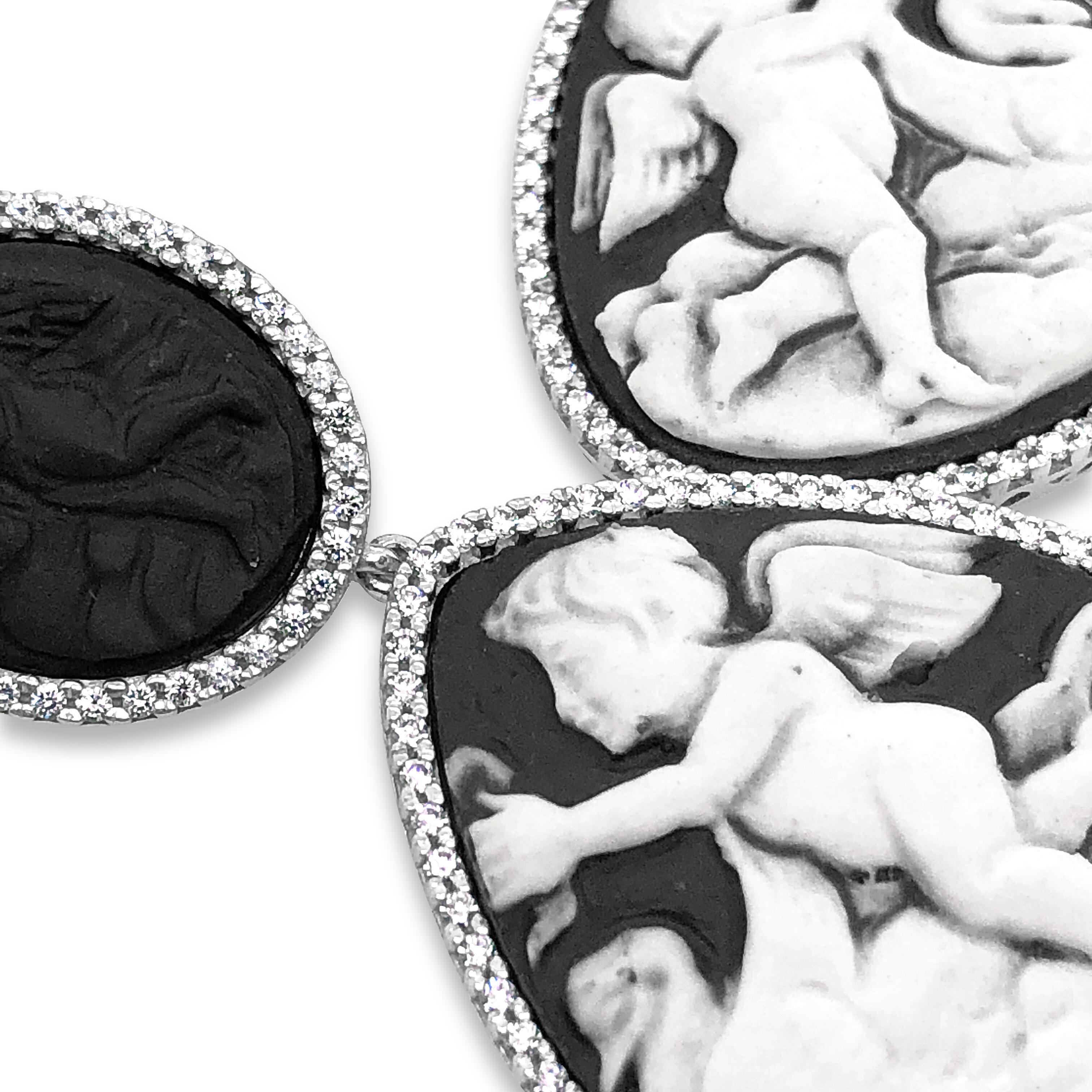 Finely detailed cameos depicting renaissance period cherubs with goose. In times past, cameos were mainly made of shells, hardstones, coral and volcanic rock, instead today the cameos which bears our family’s signature are made of fine porcelain,