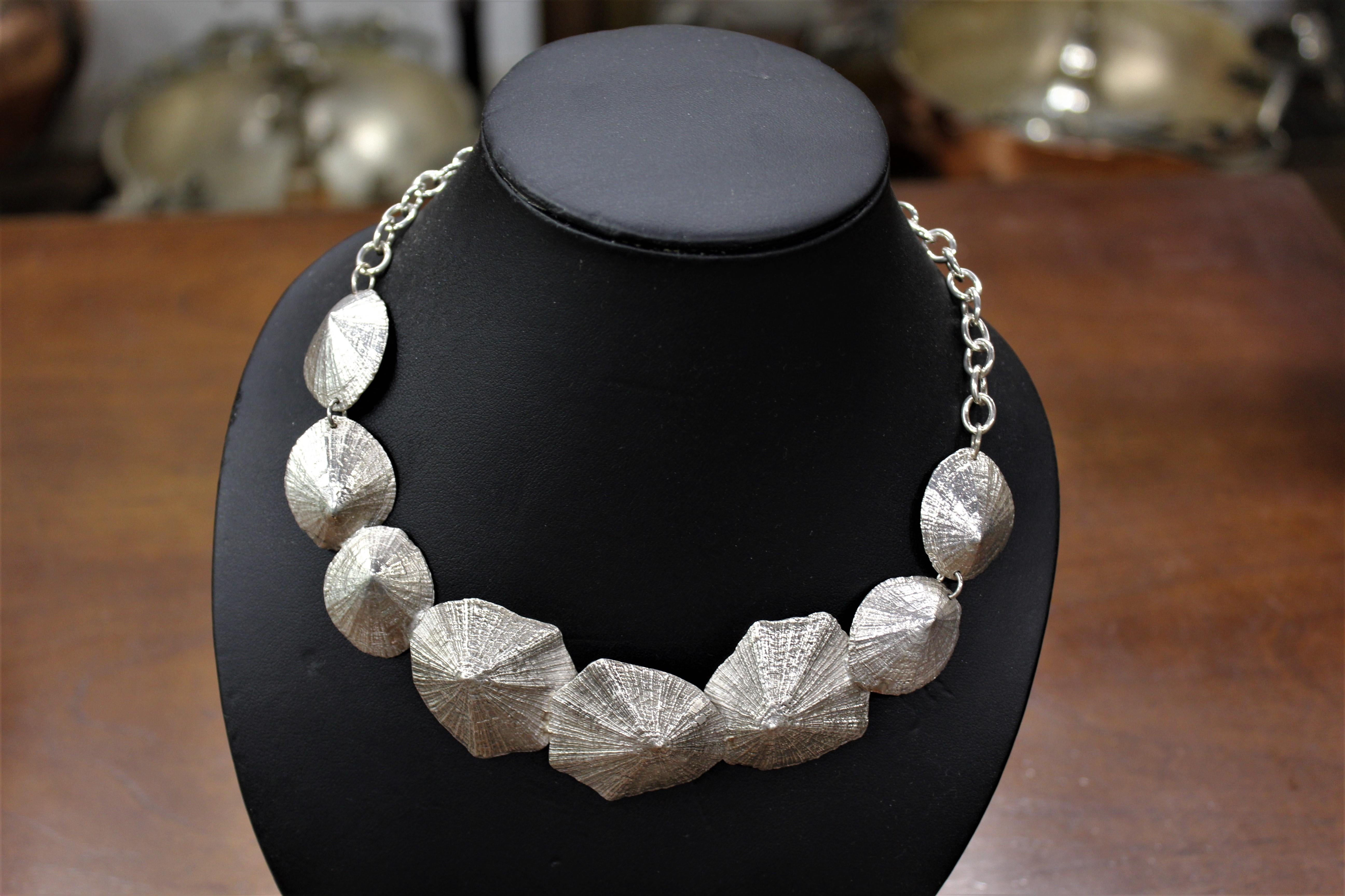The “Shell” choker is part of our jewelry collection. All our sterling silver pieces of jewelry are handmade: it means that none is like the other. As a matter of fact, our aim is to create unique products with a high artistic value. Indeed, all