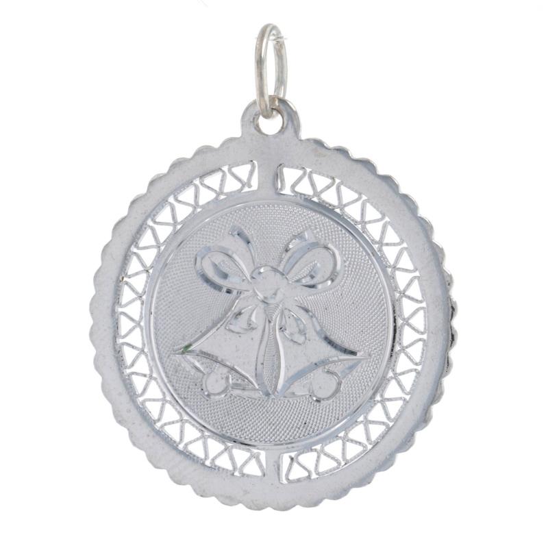 Metal Content: 925 Sterling Silver

Theme: Christmas Bells, Holiday
Features: Smooth & Textured Finishes with Milgrain Detailing & Open Cut Border

Measurements
Tall (from stationary bail): 31/32