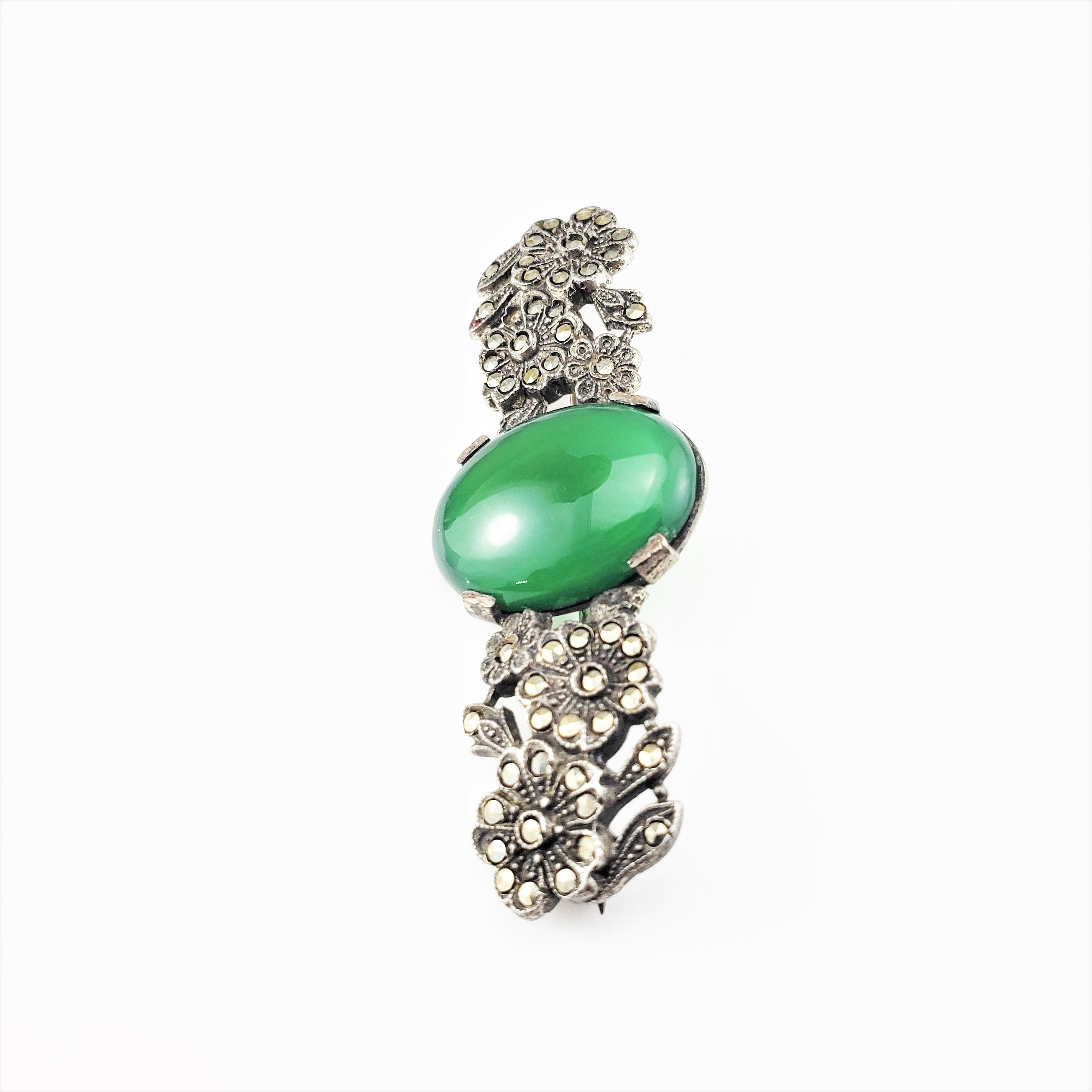 Vintage Sterling Silver Chrysoprase Marcasite Flower Brooch/Pin-

This lovely brooch features one oval chrysoprase (20 mm x 15 mm x 4 mm) and beautifully detailed marcasite flowers set in classic sterling silver.

Size: 2 1/8 inches x 13/16