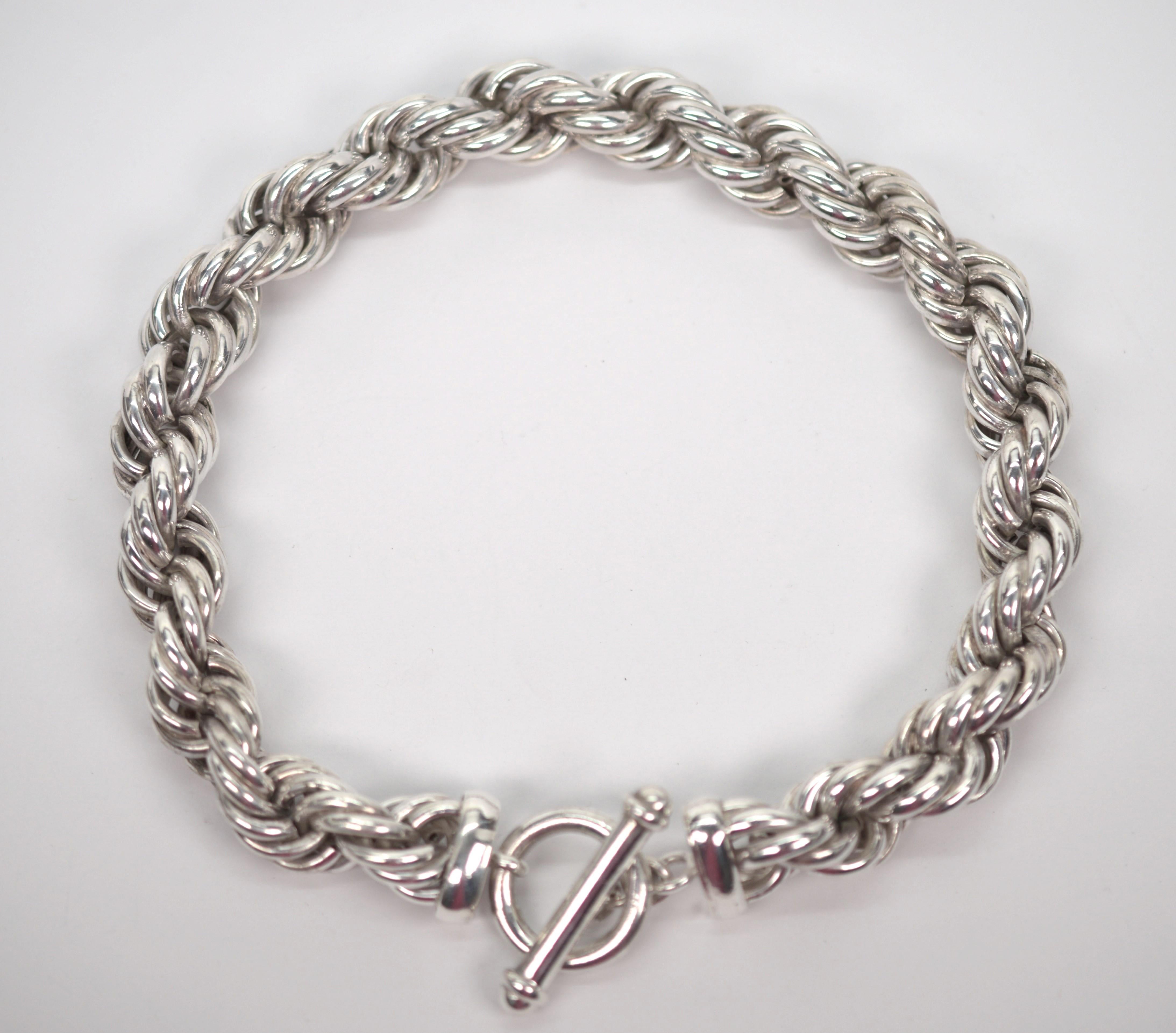 Impress with this vintage heavy gauge sterling silver twisted rope 16 inch necklace with toggle clasp. Hand assembled of .925 silver meticulously intertwined and approximately 17mm thick. Wear with toggle to back or front for an additional look.