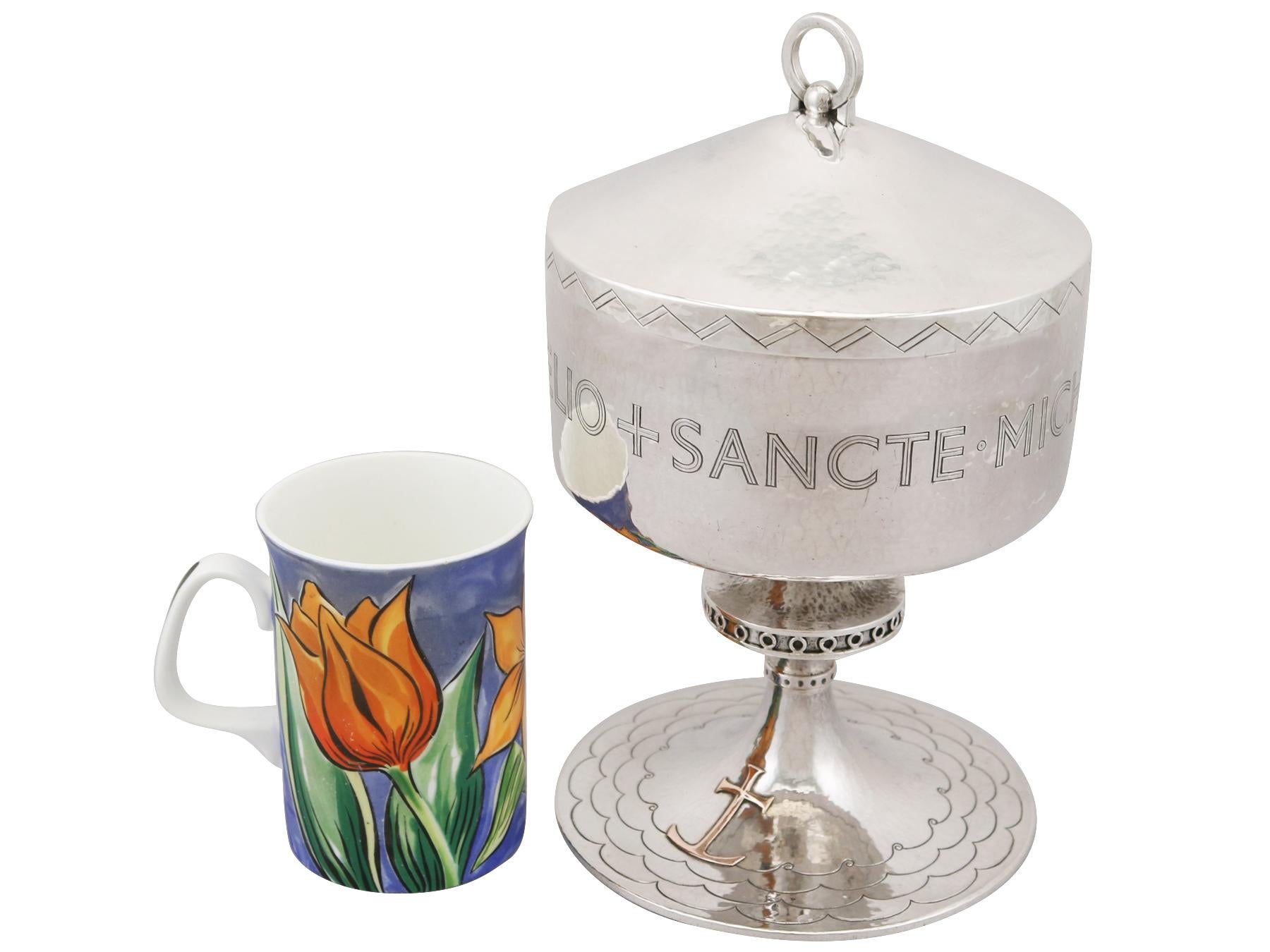 An exceptional, fine and impressive vintage English sterling silver ecclesiastical ciborium with nautical interest, in the Arts & Crafts style; an addition to our religious silverware collection.

This exceptional vintage sterling silver