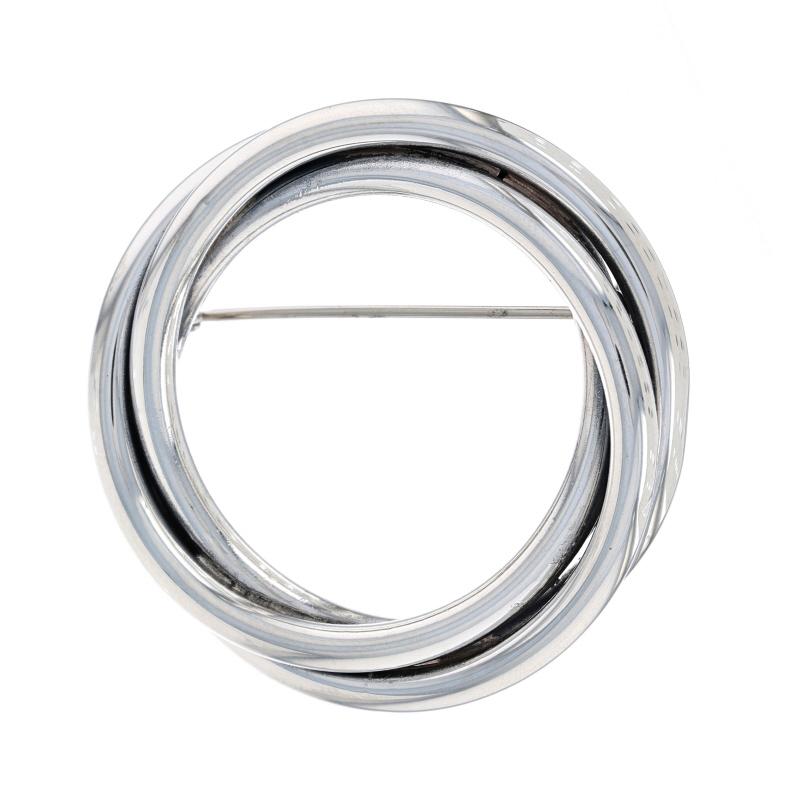 Metal Content: Sterling Silver

Style: Brooch
Fastening Type: Hinged Pin and Whale Tail Bullet Clasp
Theme: Circle Wreath, Rope Twist
Features: Hollow construction for comfortable wear

Measurements

Tall: 1 11/16