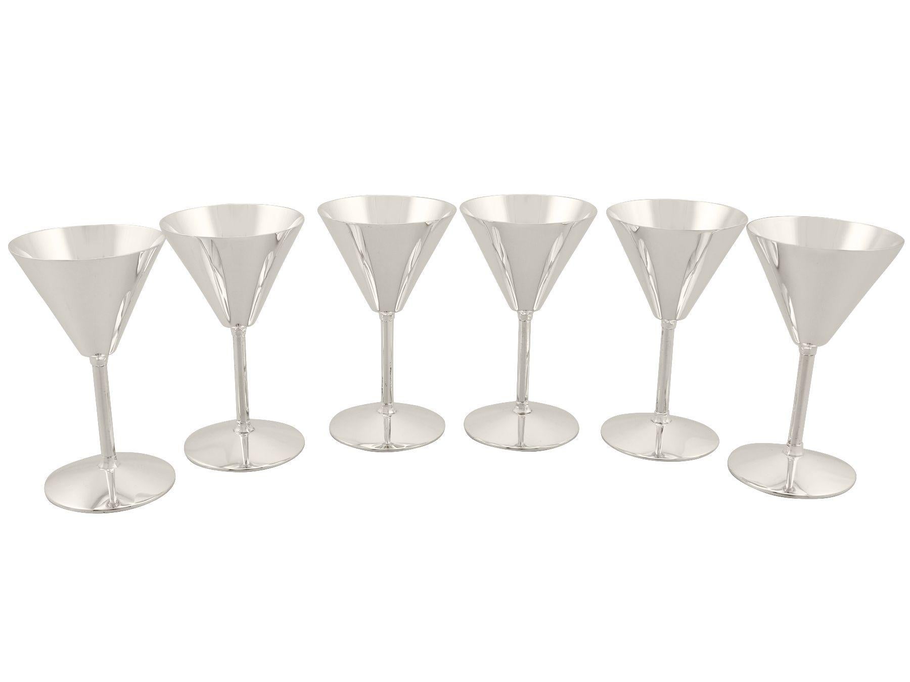 An exceptional, fine and impressive set of six vintage Elizabeth II English sterling silver cocktail glasses in the Art Deco style; an addition to our range of collectable silverware

These exceptional vintage sterling silver cocktail glasses have a