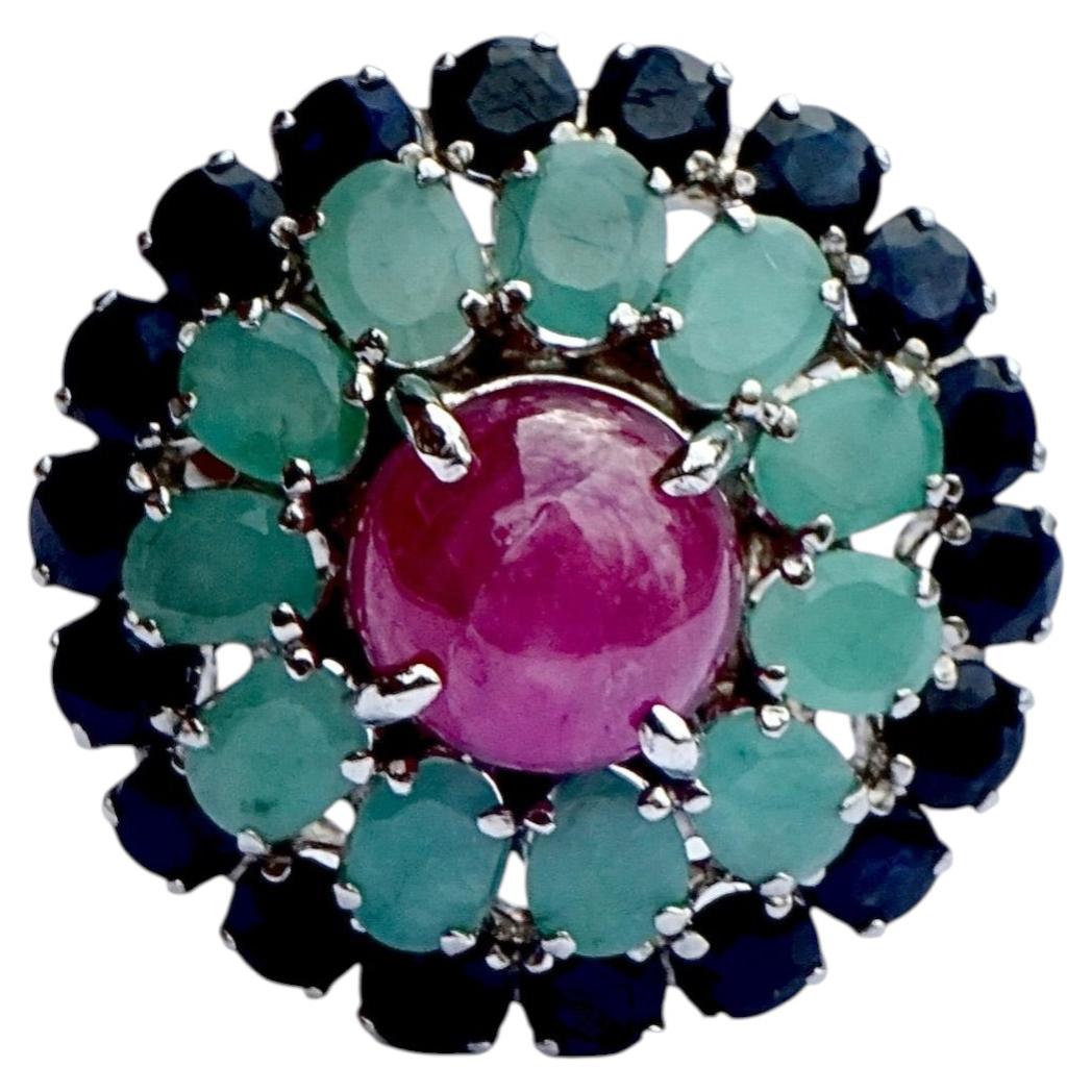 Sterling Silver Cocktail Ring set with a Ruby, Emeralds and Sapphires For Sale