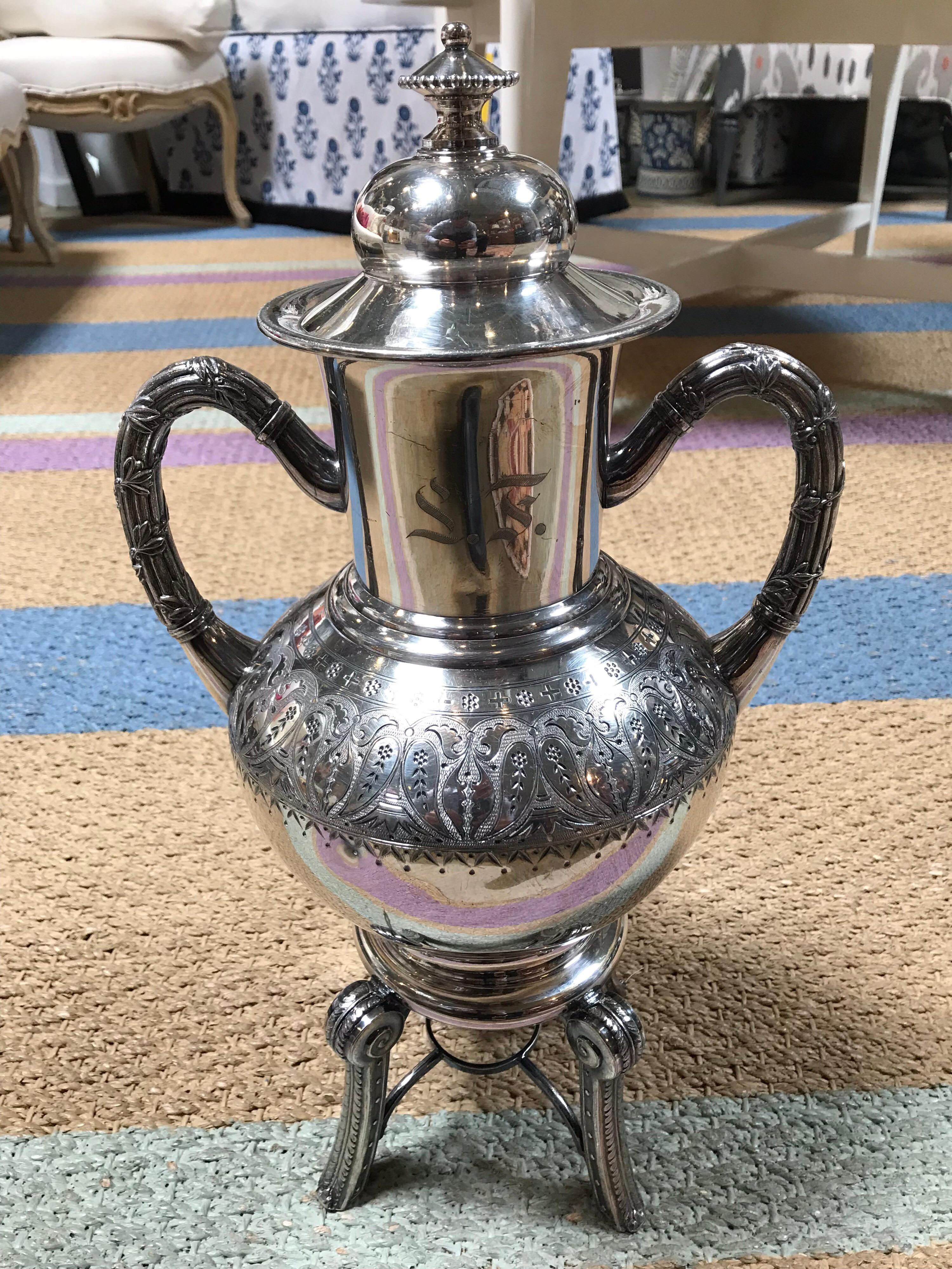 silver coffee dispenser