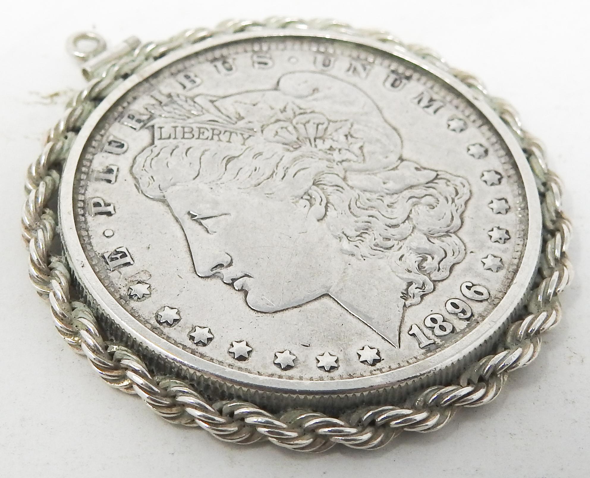 Offering this beautiful sterling silver coin pendant. The coin is from 1896, E. Pluribus Unum is on the front with Anna Willess Williams profile. The back has United States of America, In God we Trust, One Dollar with the Eagle and its wings