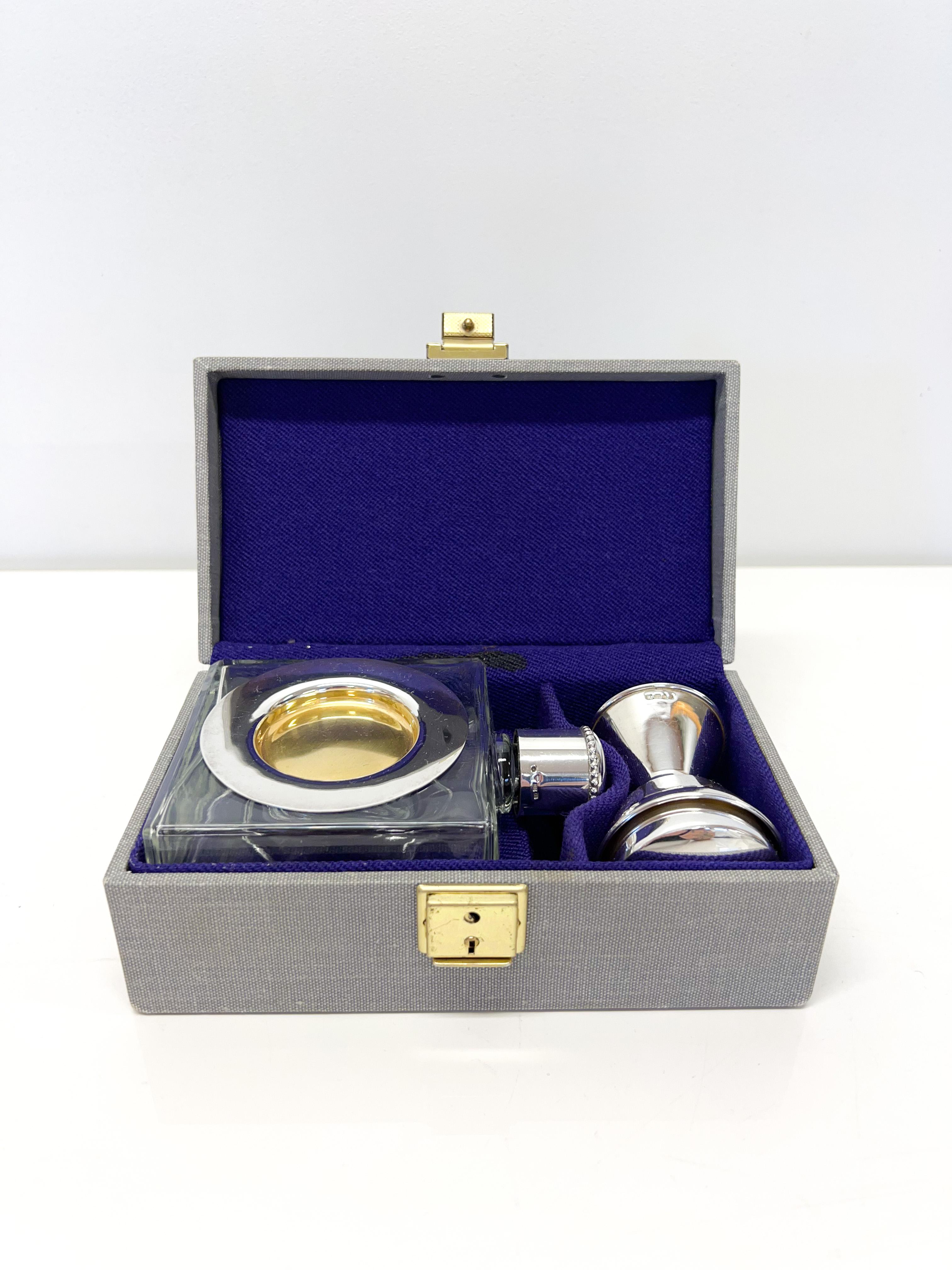 Sterling Silver Communion Utensils
Silver and Glass.
925 Silver
Made according to the stamps in 1977 in Finland.
A really nice little travel set.
A small bottle of wine in a box inside.
Bottle tested with water and holds liquid inside.
The width of