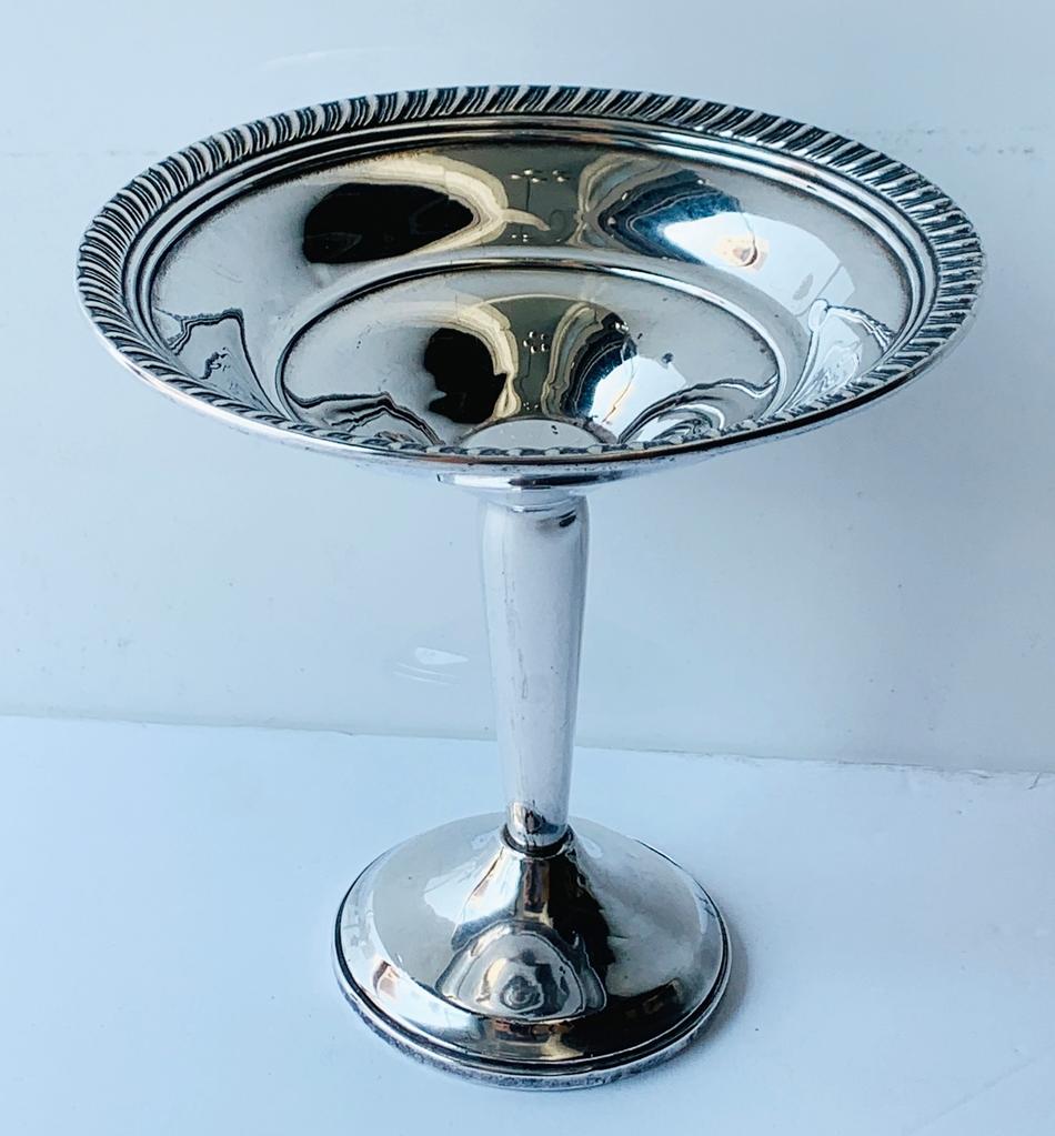 Introducing our exquisite Vintage Sterling Silver Compote/Candy Dish, a timeless piece that adds a touch of elegance to any setting. Crafted with the utmost precision and attention to detail, this stunning compote dish is a must-have for those