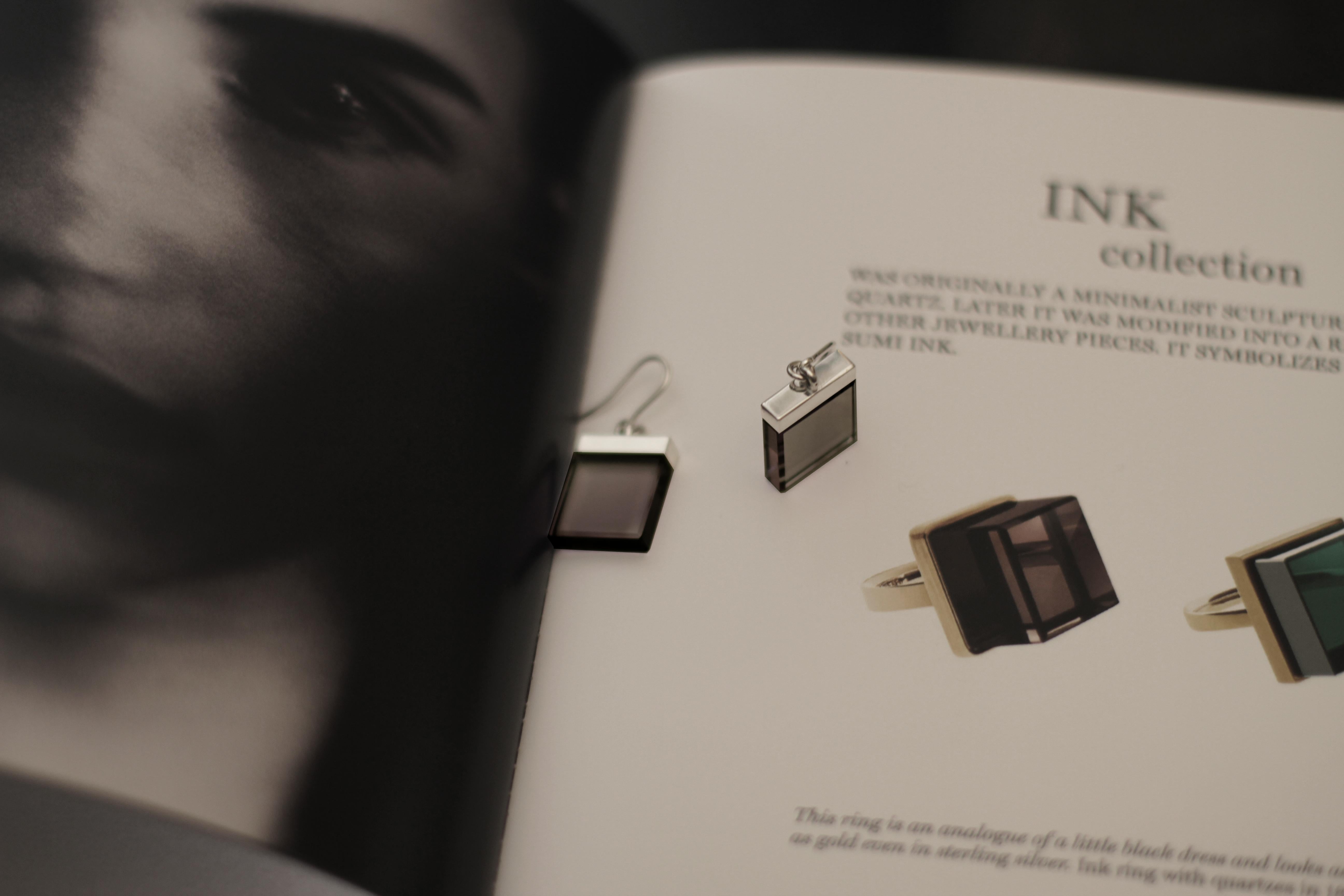 This contemporary jewellery collection was featured in Harper's Bazaar UA and Vogue UA published issues. 

The earrings are in sterling silver with 15x15x3 mm size natural transparent tender smoky quartzes, which look delicate and sparkly. 

Ink