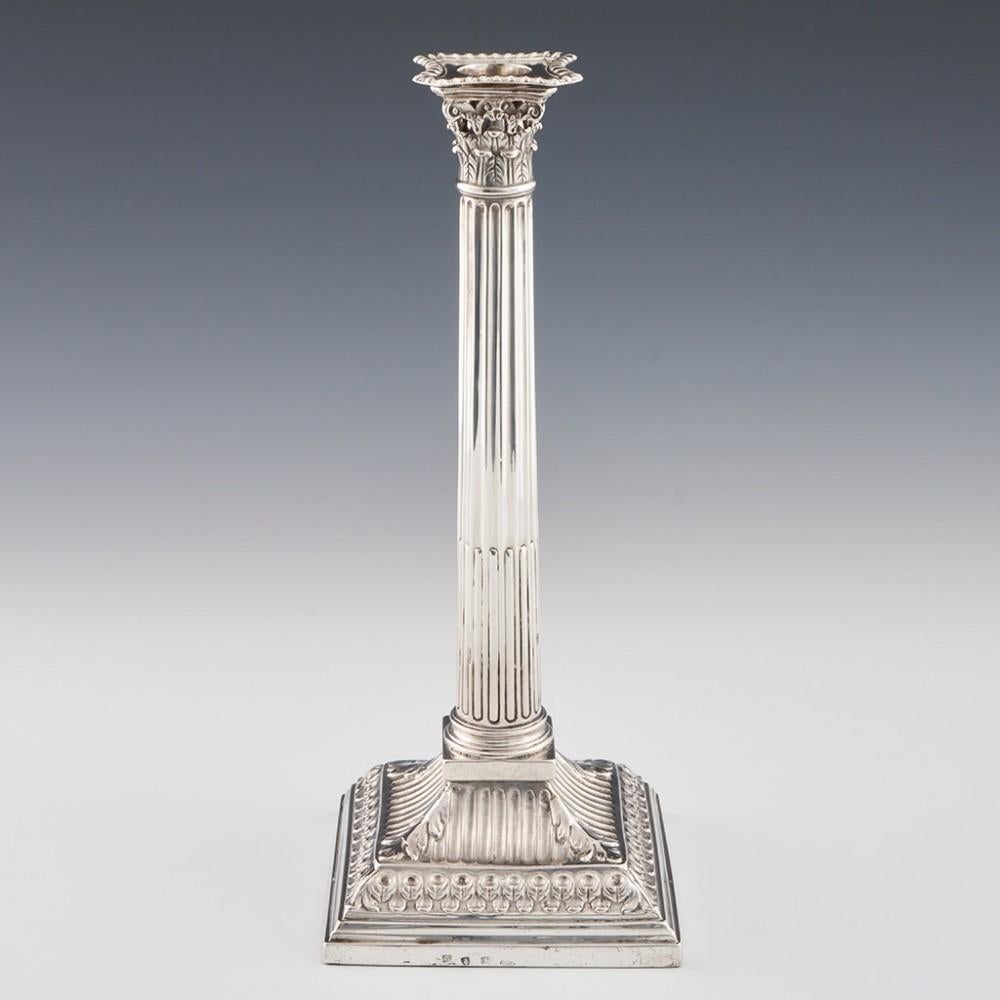 Heading : Sterling silver corinthian candlesticks
Date : Hallmarked in London in 1763 for William Cafe
Period : George III
Origin : London, England
Decoration : Square terraced bases with foliate borders and fluted section. Fluted tapering stems