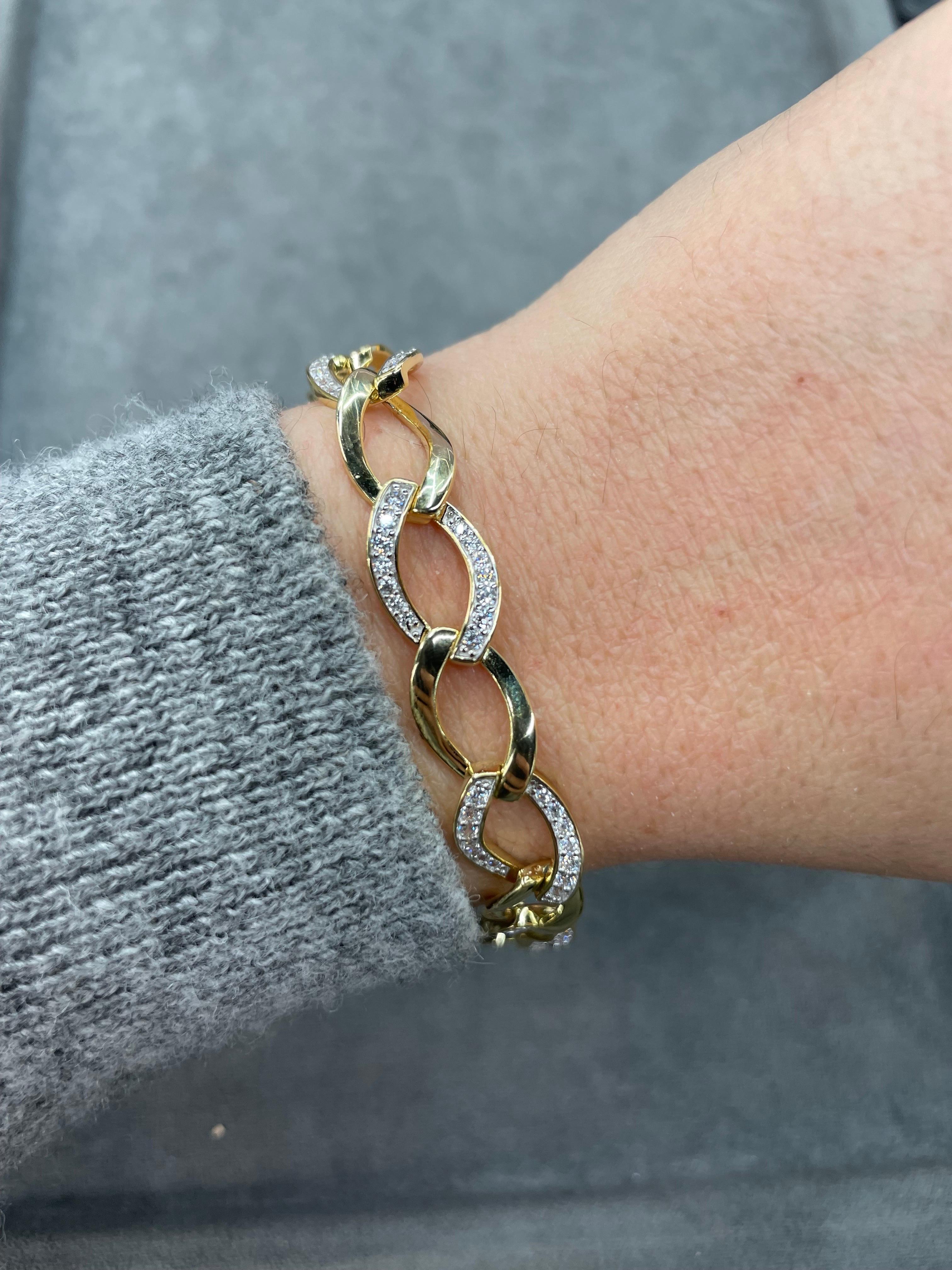Sterling silver bracelet featuring marquise shape links with alternating cubic zirconia and high polish links. 
Will not tarnish, high quality silver!