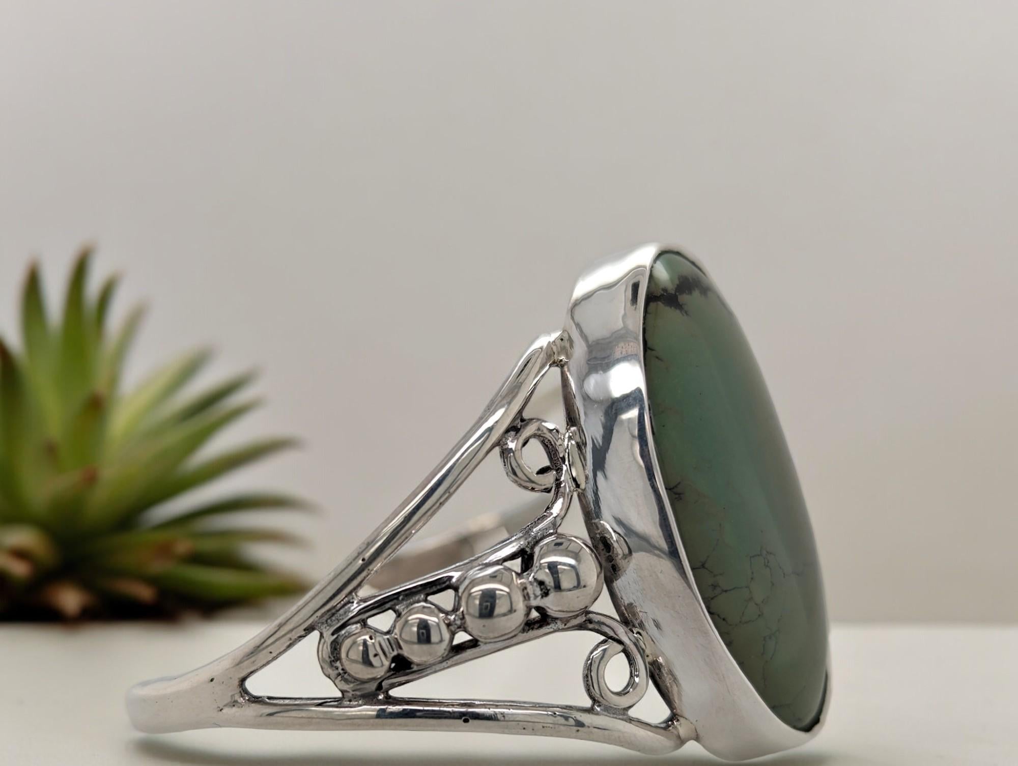 Artisan Sterling Silver Cuff Bracelet with Captivating Green Gemstone For Sale