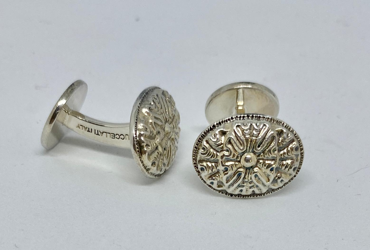 Unusual, oval-faced cufflinks in sterling silver by Gianmaria Buccellati.

The cufflink faces measure approximately 13 by 18 mm; the round backs are 13mm in diameter. Together the pair weighs 15.4 grams.

The cufflinks are signed BUCCELLATI,