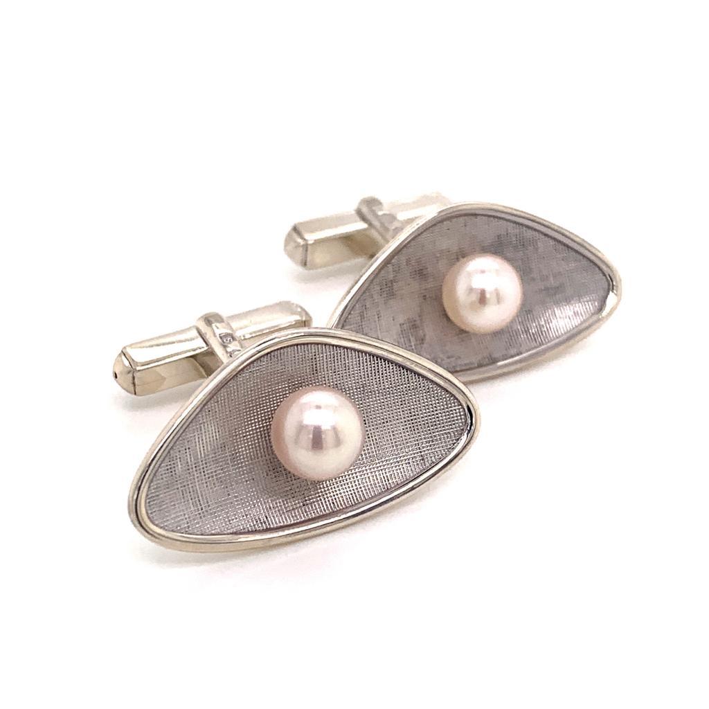 MIKIMOTO STERLING SILVER CUFFLINKS 5.14 GRAMS 6.25 MM PEARLS M126

TRUSTED SELLER SINCE 2002

PLEASE SEE OUR HUNDREDS OF POSITIVE FEEDBACKS FROM OUR CLIENTS!!

FREE SHIPPING

This elegant Authentic Mikimoto Sterling Silver Men's Cuff-links has 2