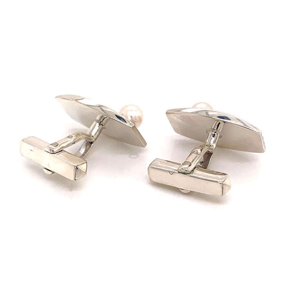 MIKIMOTO STERLING SILVER CUFFLINKS 6.31 GRAMS 5.15 MM PEARLS M127

TRUSTED SELLER SINCE 2002

PLEASE SEE OUR HUNDREDS OF POSITIVE FEEDBACKS FROM OUR CLIENTS!!

FREE SHIPPING

This elegant Authentic Mikimoto Men's Sterling Cufflinks Cuff-links has 2