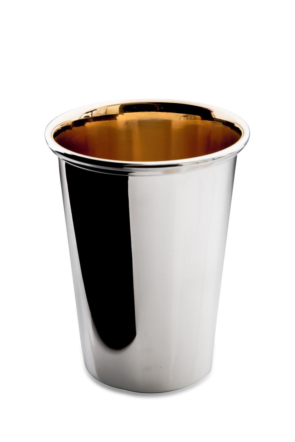 A sterling silver cup, handmade in Vienna. Inside it’s 24-Karat gold-plated.
  