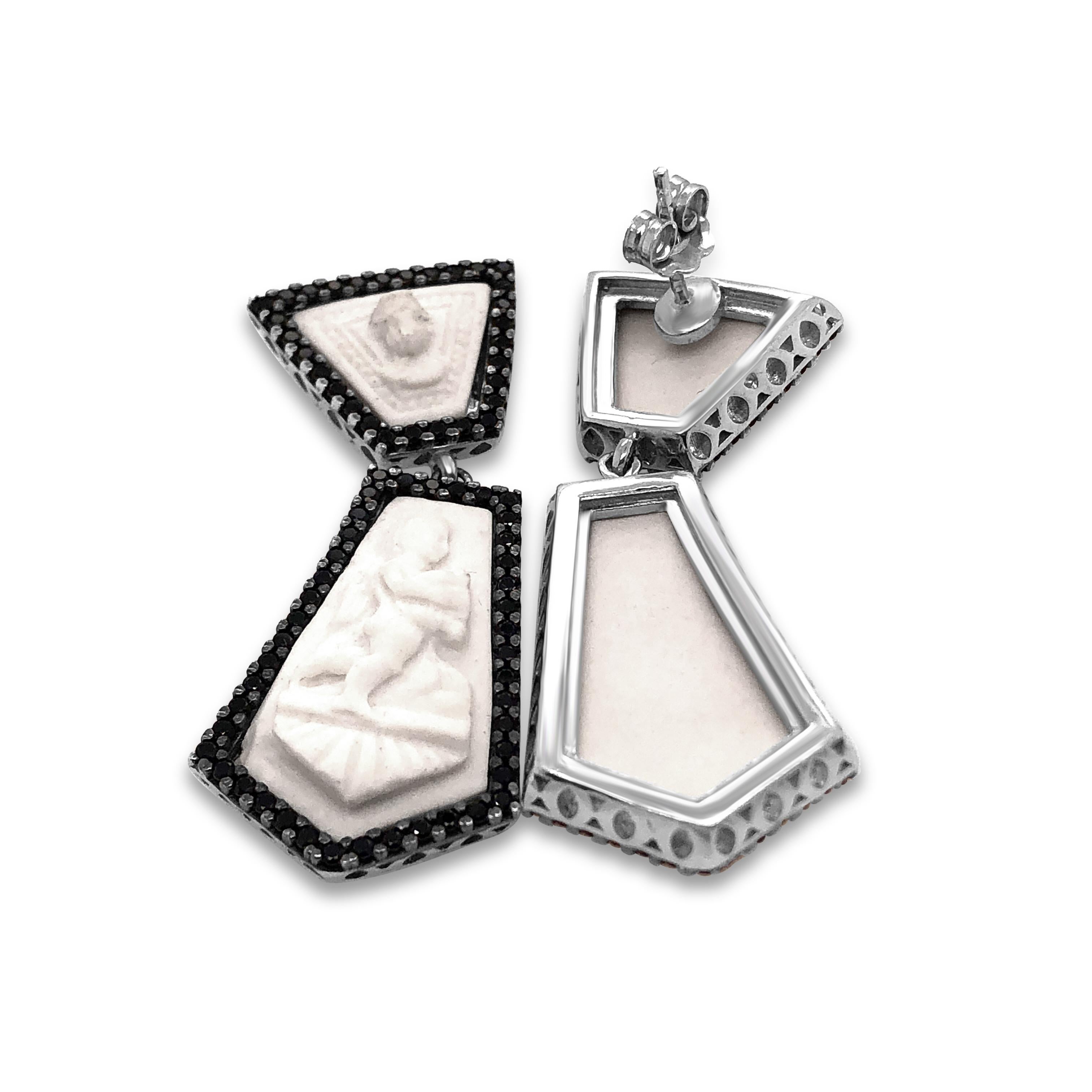 Finely detailed porcelain cameos depicting renaissance period cupids playing chitara. In times past, cameos were mainly made of shells, hardstones, coral and volcanic rock, instead today the cameos which bears our family’s signature are made of fine