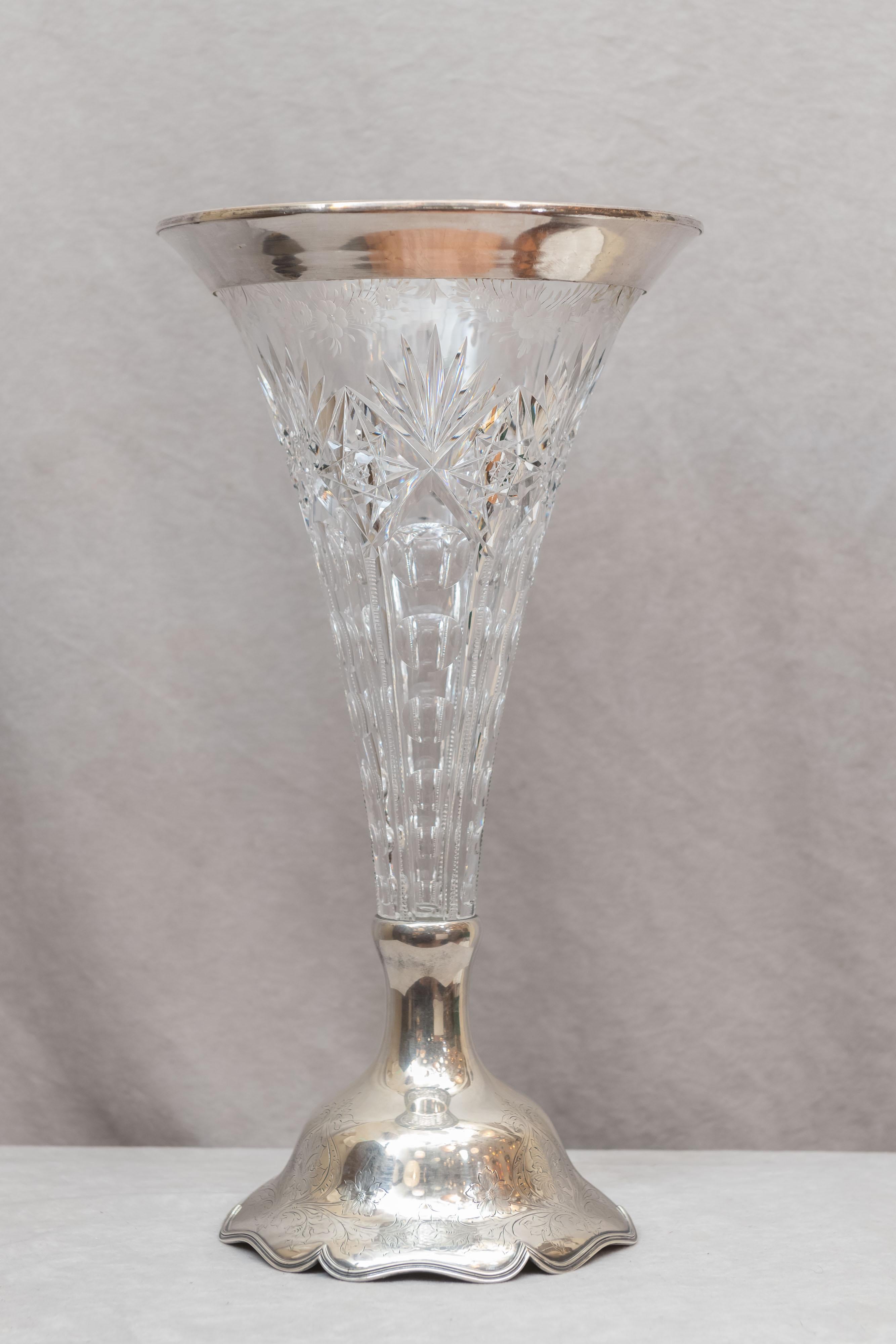 This very impressive vase will make any place in your home a place of importance. The glass is brilliant cut and the silver was made by one of the most respected makers of the time period, Shreve.
We felt every area of the glass for a chip, none.