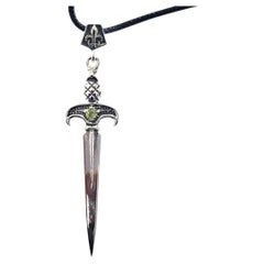 Sterling Silver Dagger Pendant with Peridot – Made in USA Bold. Symbolic.