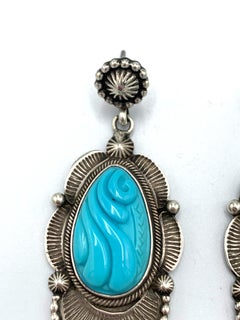 Sterling Silver Dangle Earrings with Carved Turquoise Cabochons by Rick Martinez